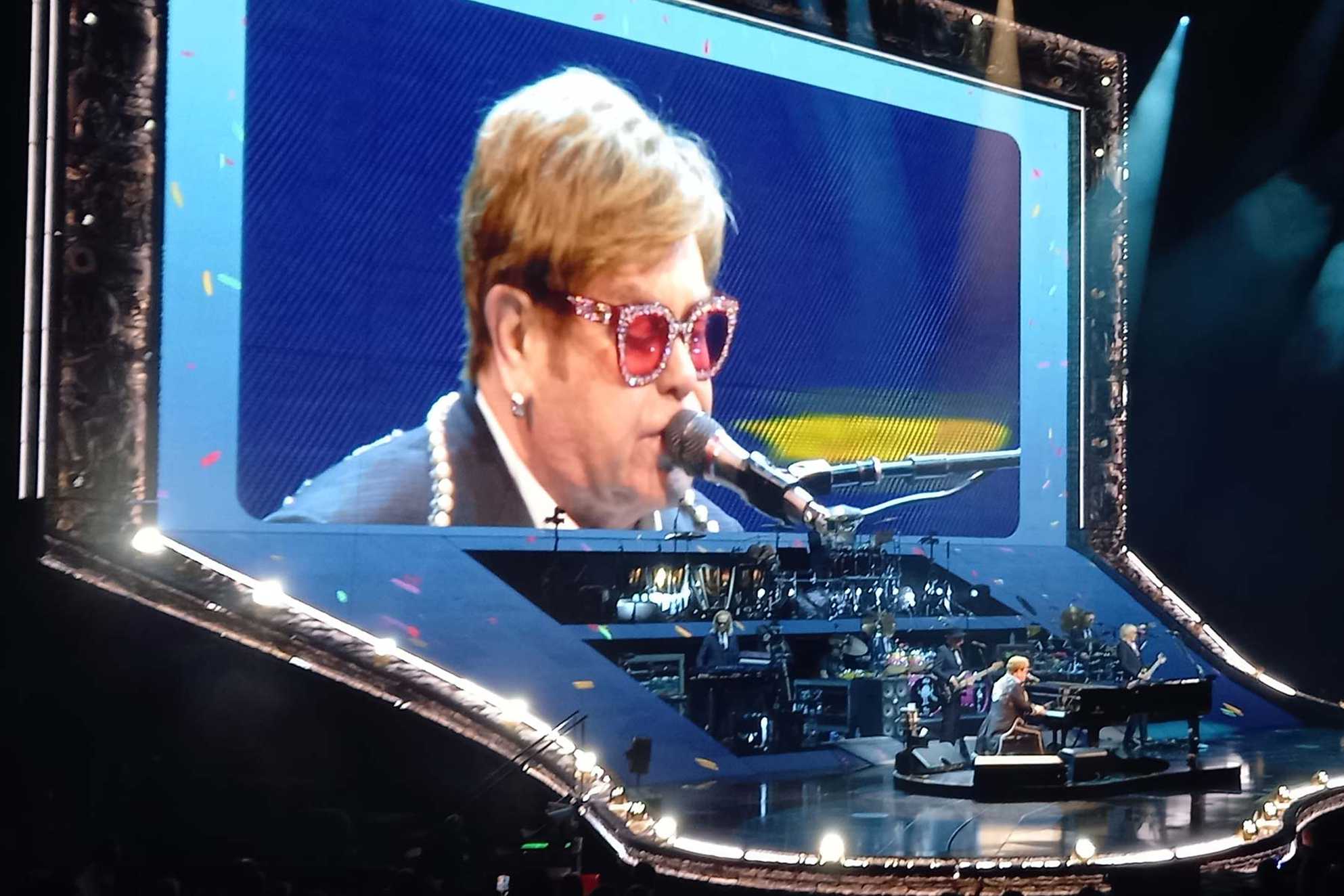 Oliver had a great view of Elton John playing the piano.