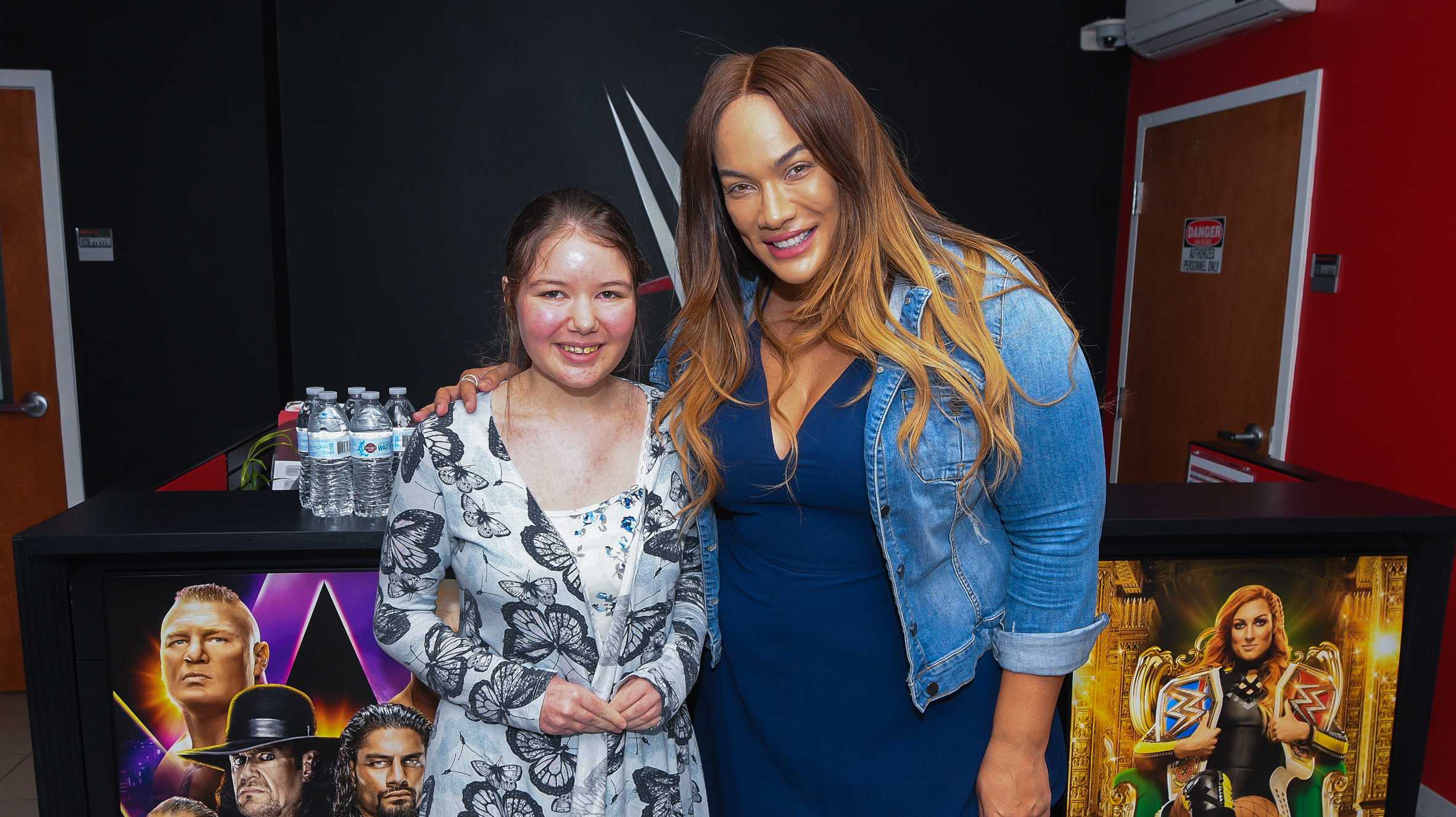 Rhianna with WWE wrestler