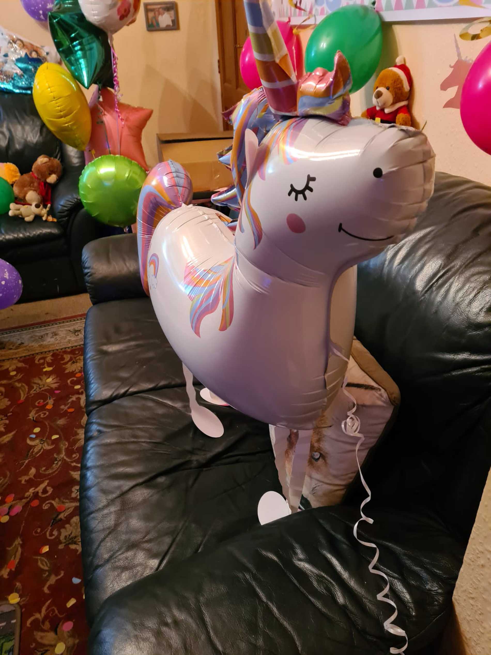 One of Leah's birthday decorations, a large unicorn balloon.