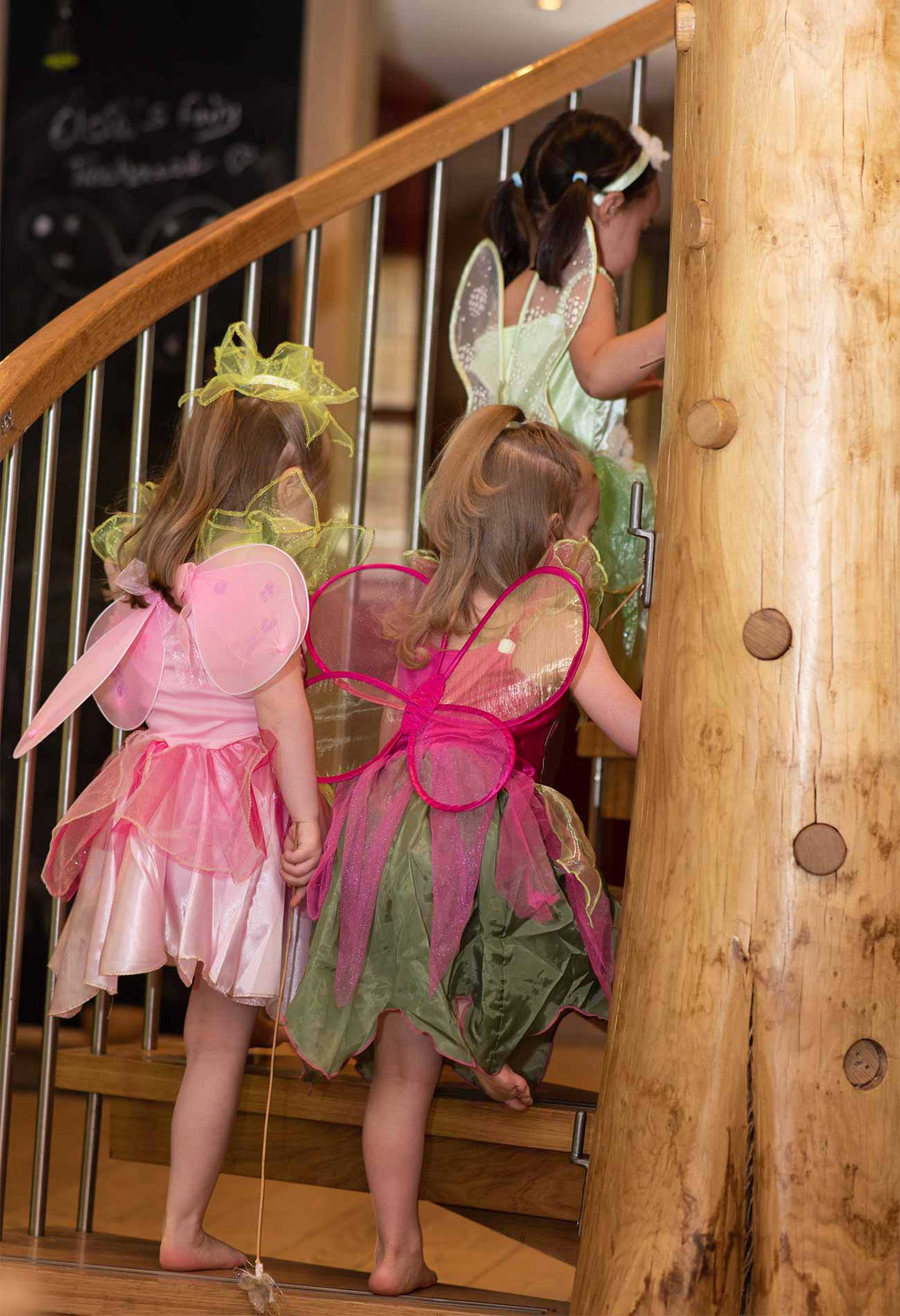 Elsie and her cousins exploring the treehouse