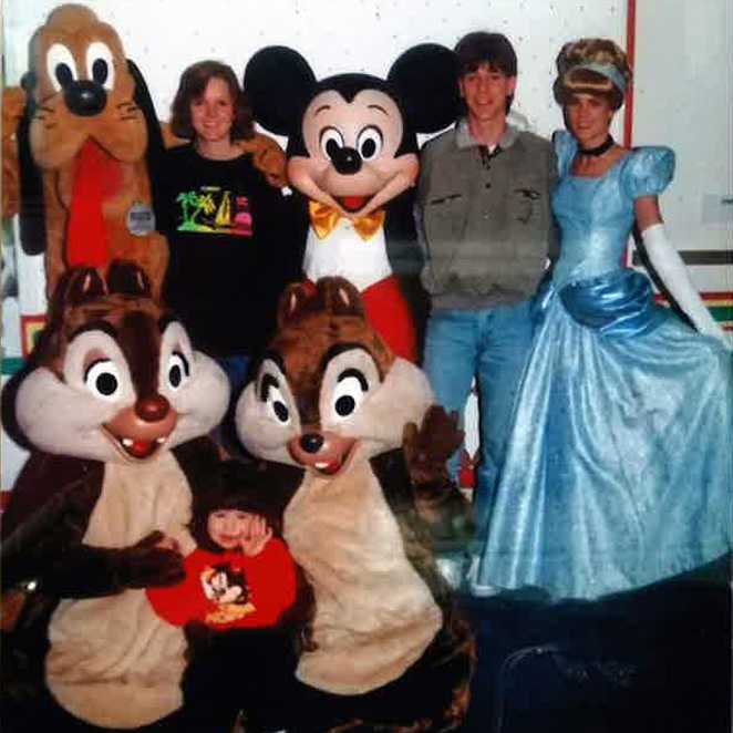 Charlotte with some Disney characters during her wish.