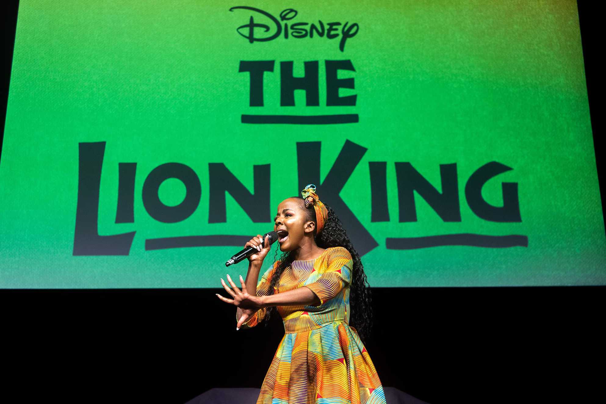 A performer from the cast of Lion King: The Musical performing a number from the show at the 2022 Make-A-Wish Ball.