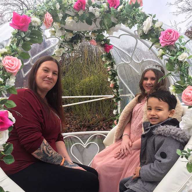 Amber in the carriage with mum, Chantelle and brother, Cruz.