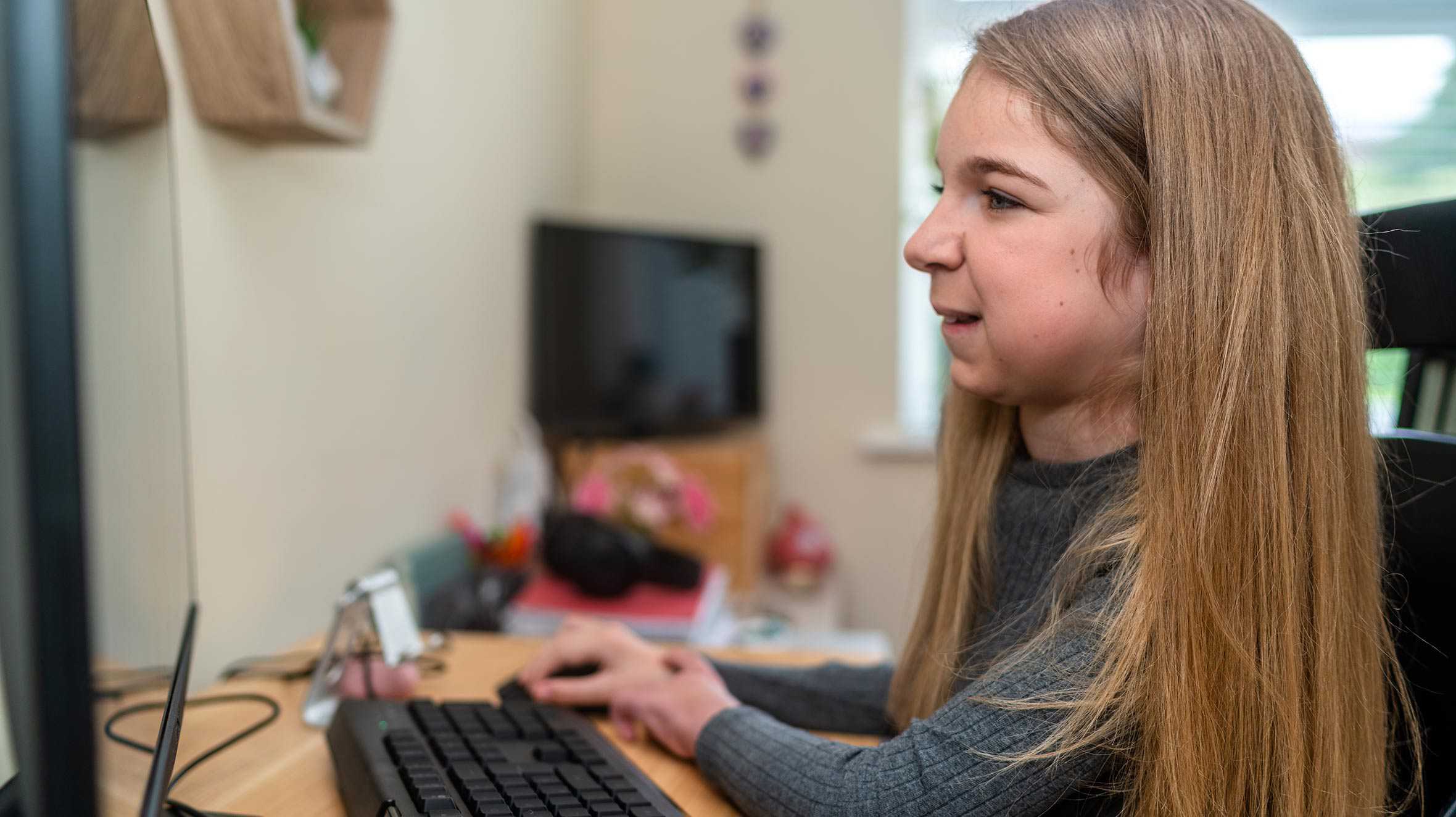 Sophie using her new gaming PC.