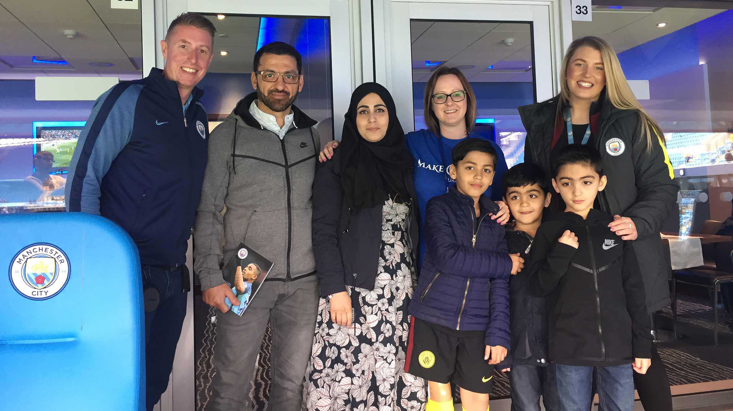 Idris and his family at the Etihad Stadium