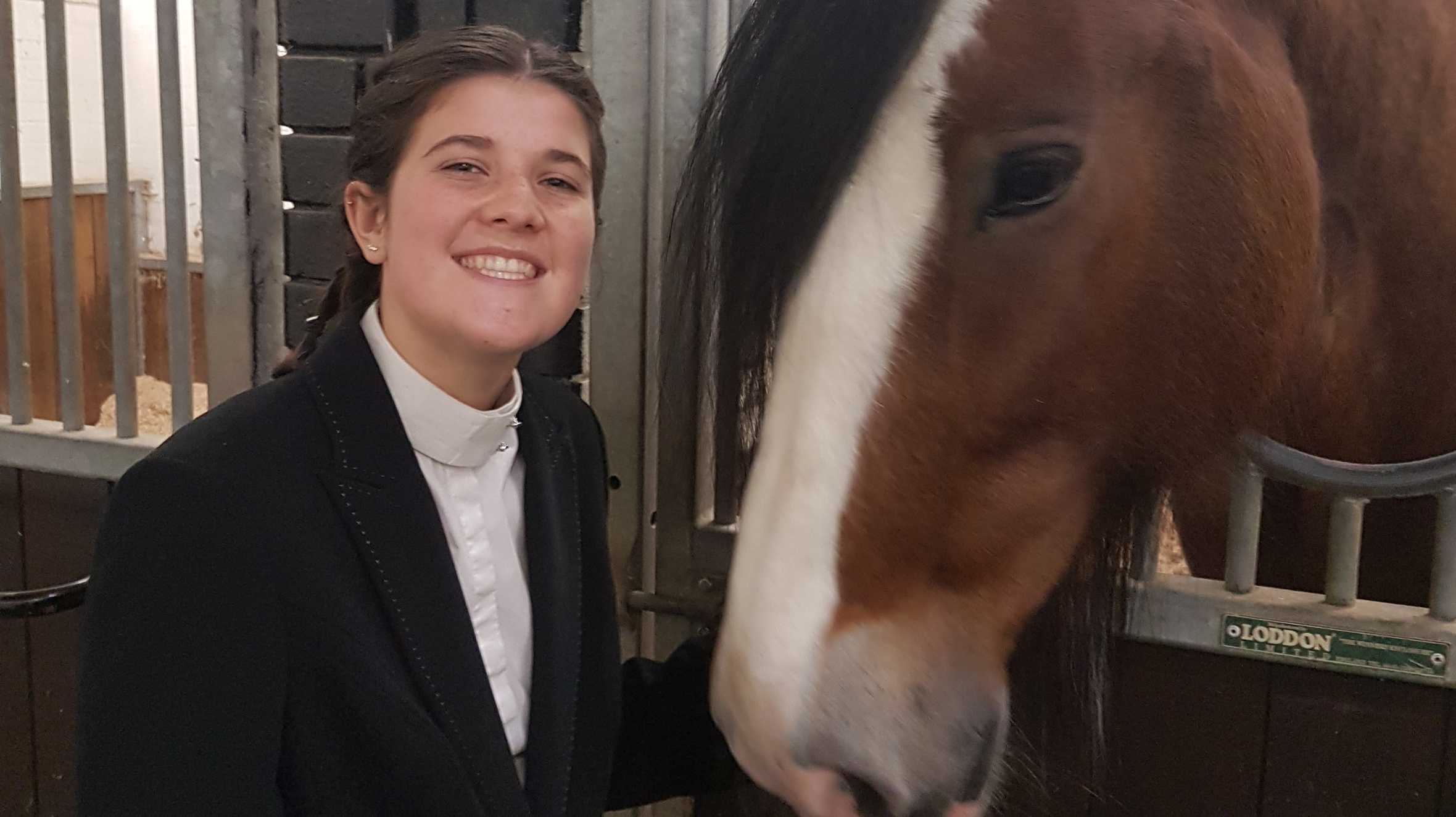 Emilia smiling with the horse