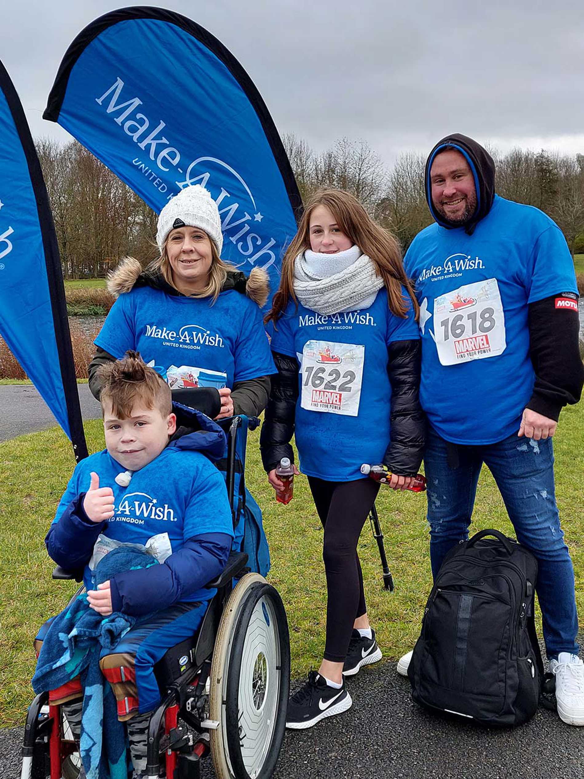 Wish child, Mikey and his family taking part in the 2021 Superhero Tri challenge event.