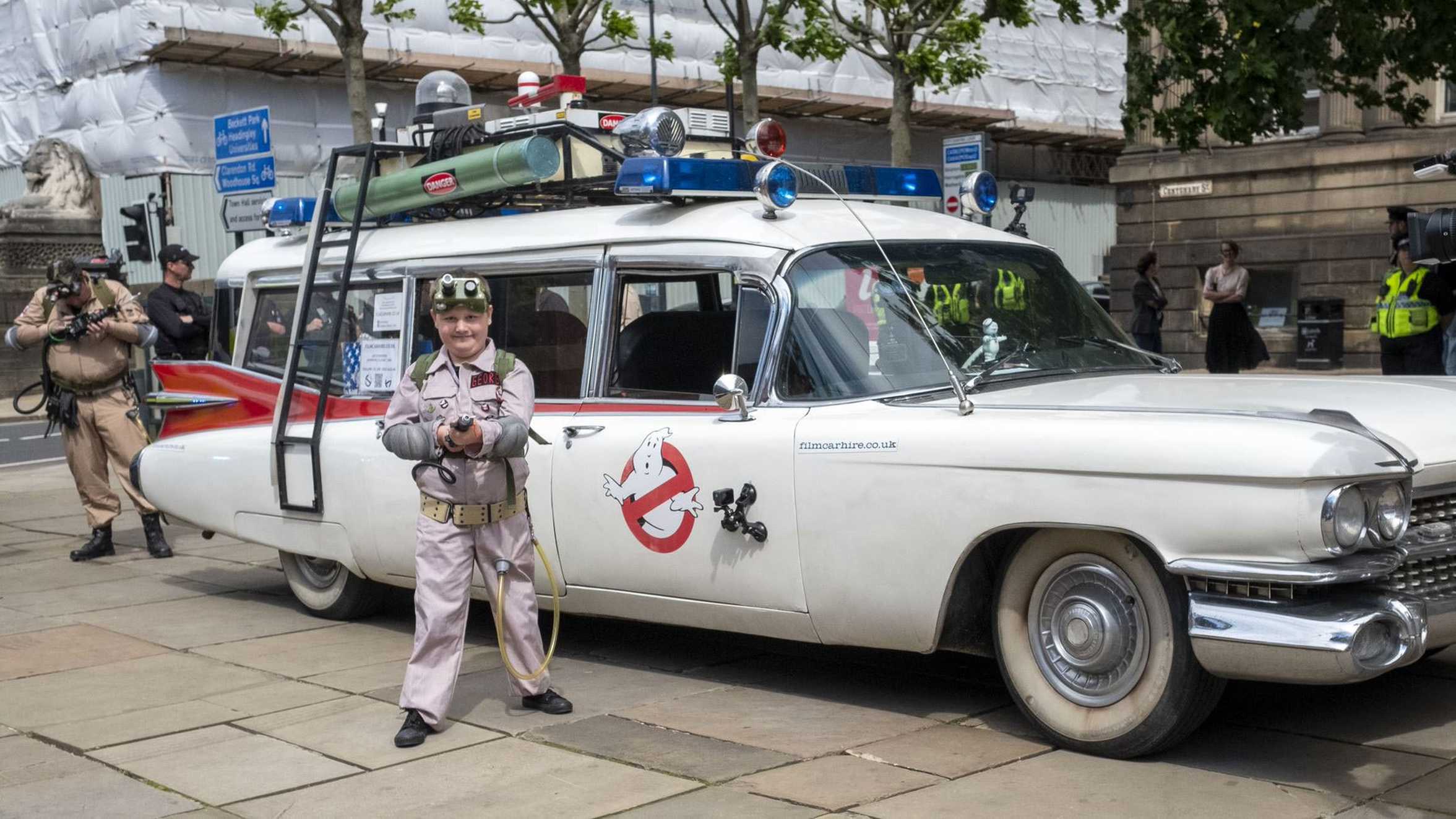 George posing with Ecto 1 outside Leeds Library.