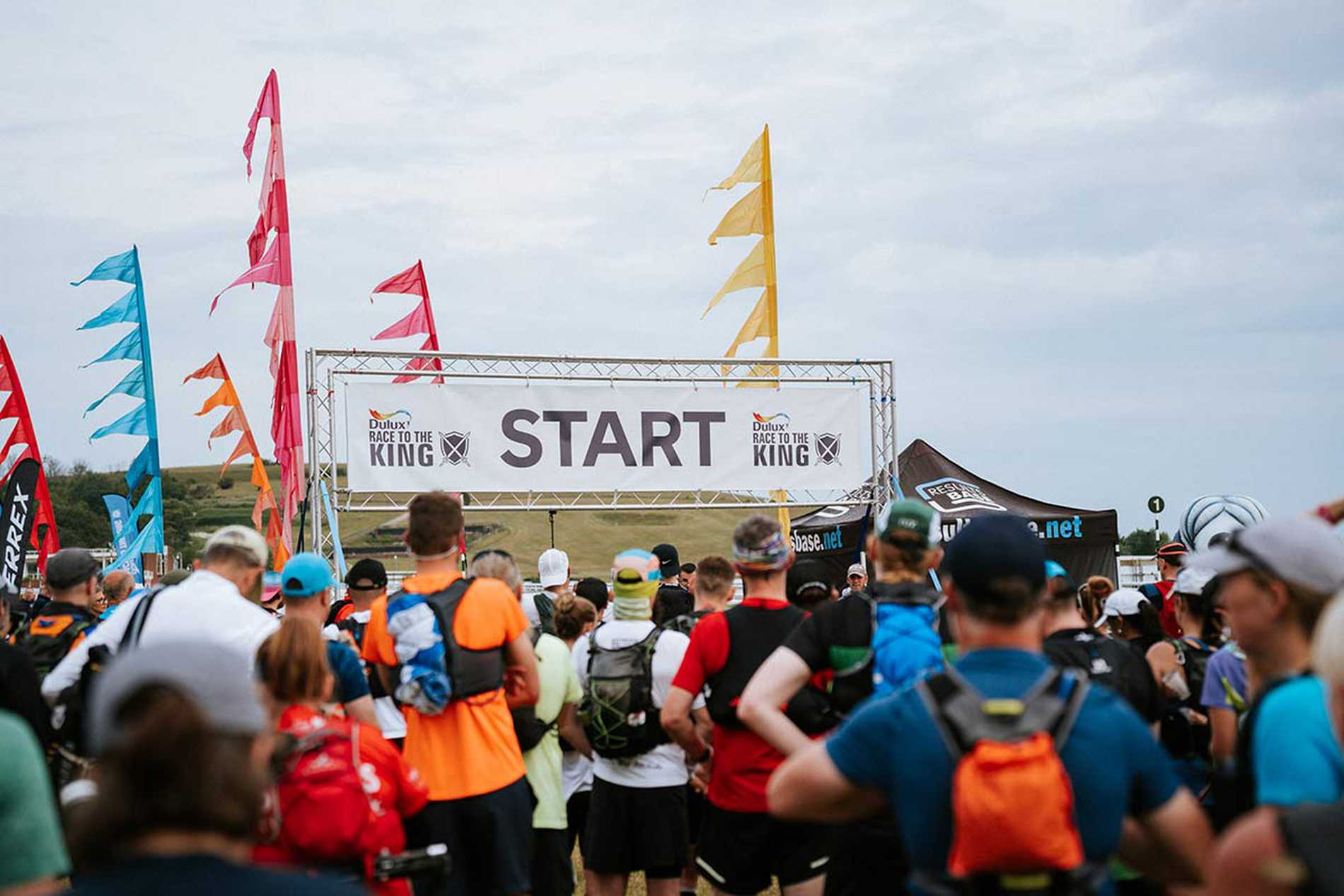 Eager participants waiting at the start line, ready to embark on the Race to the King.
