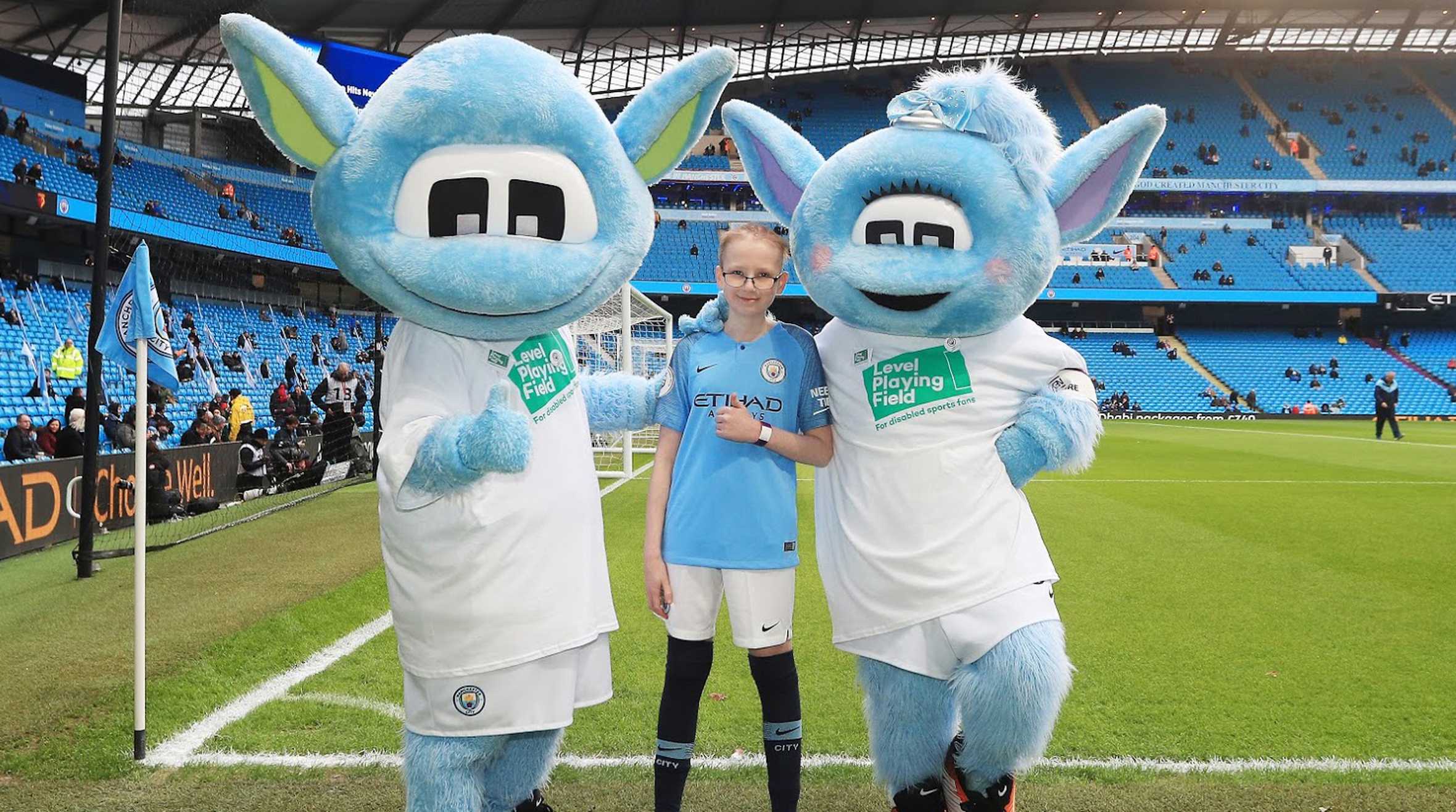 Ryan with club mascots Moonbeam and Moonchester
