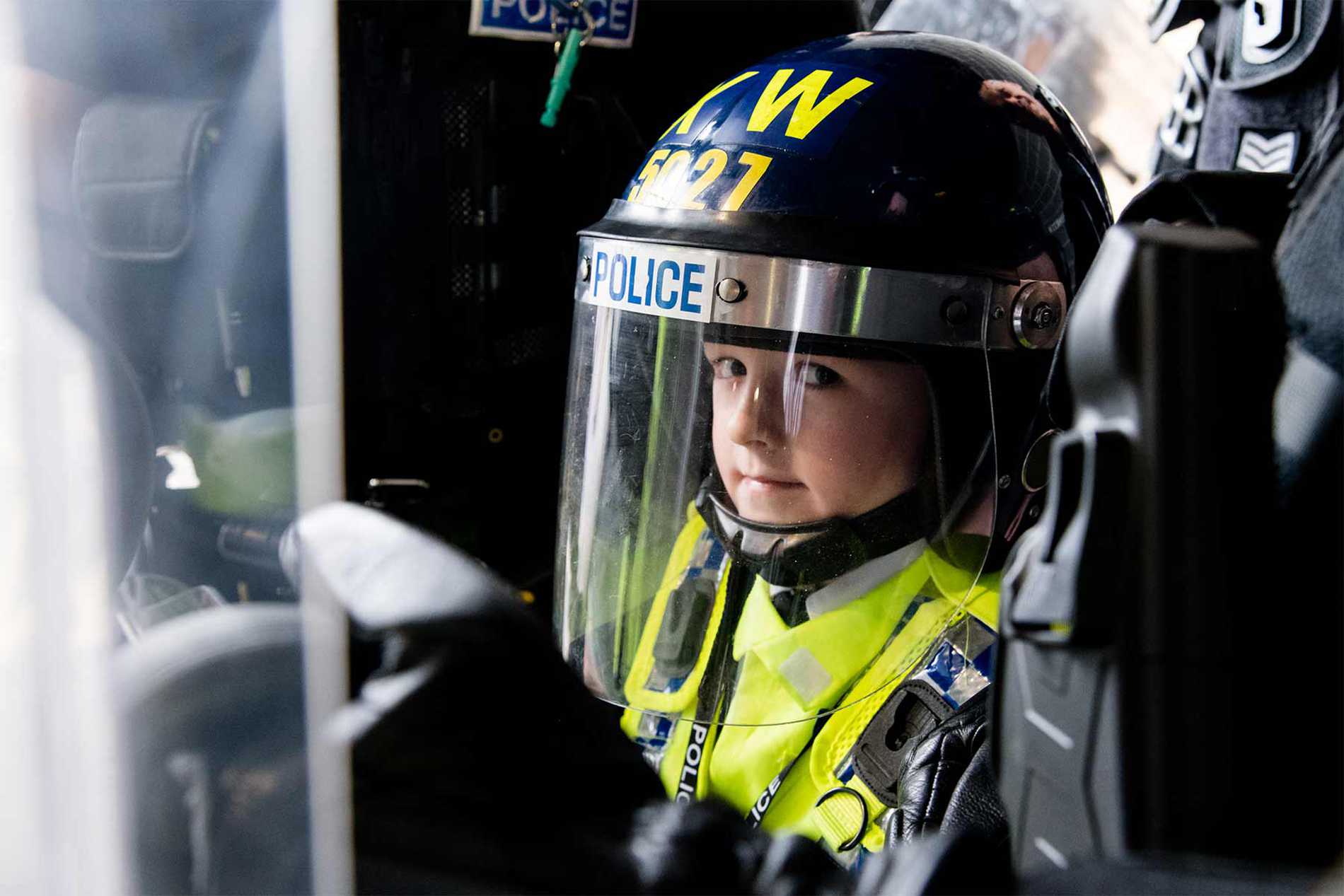 Allan wearing a riot helmet.
