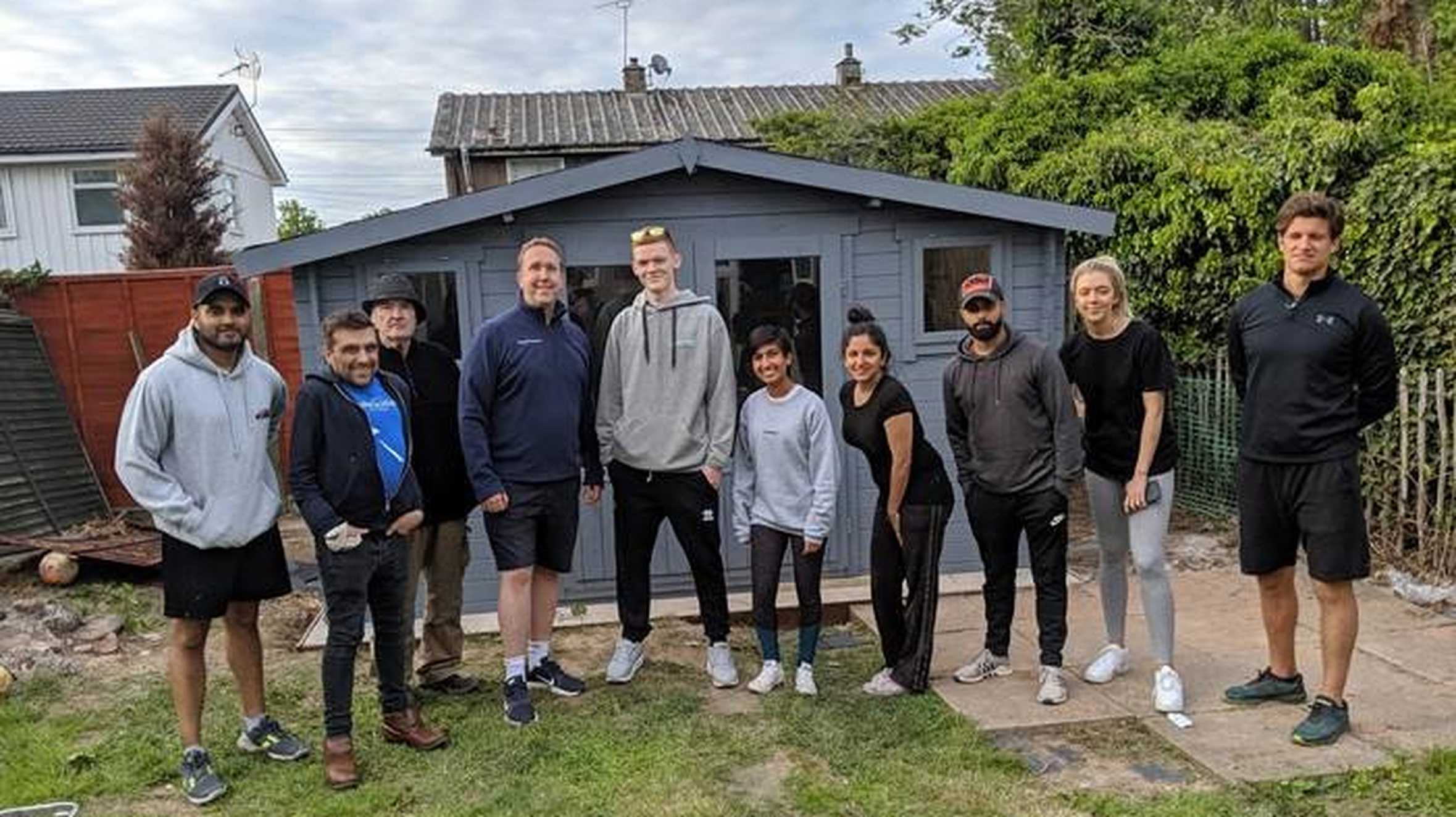 Mark (2nd from left) and other volunteers helping to grant a child's wish.