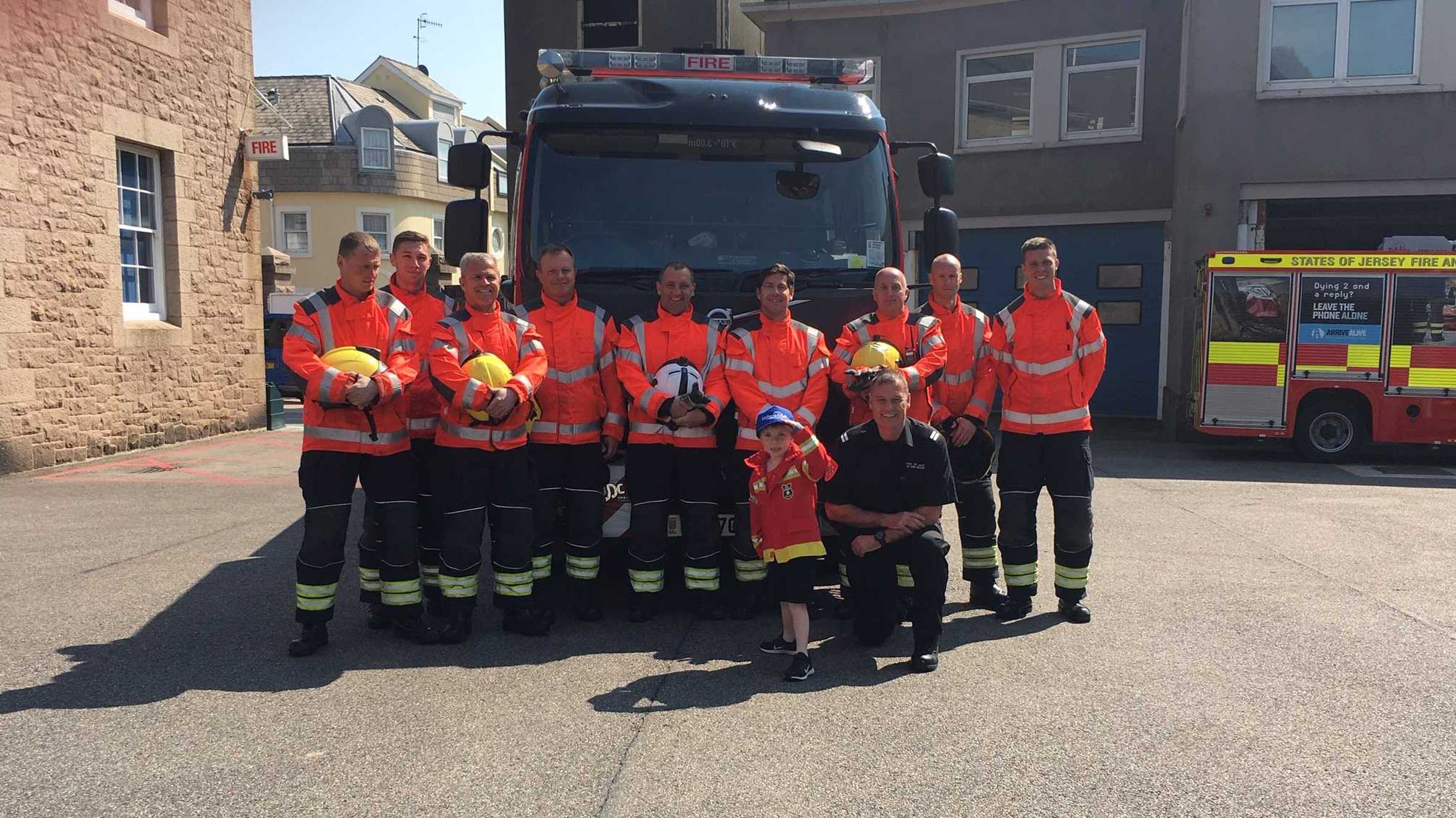 Wish child Jayden with the Jersey Fire Service