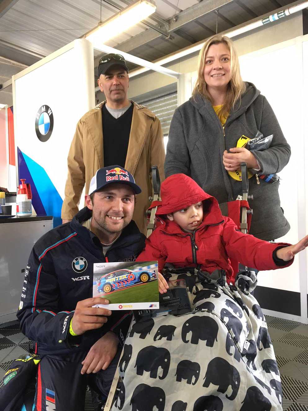 Zaid and his parents and racing driver