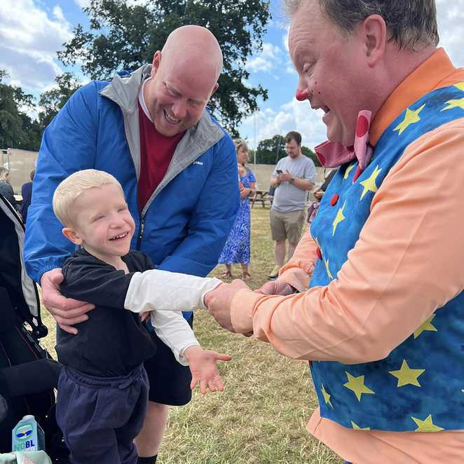 Lennon and his dad meeting Mr Tumble.