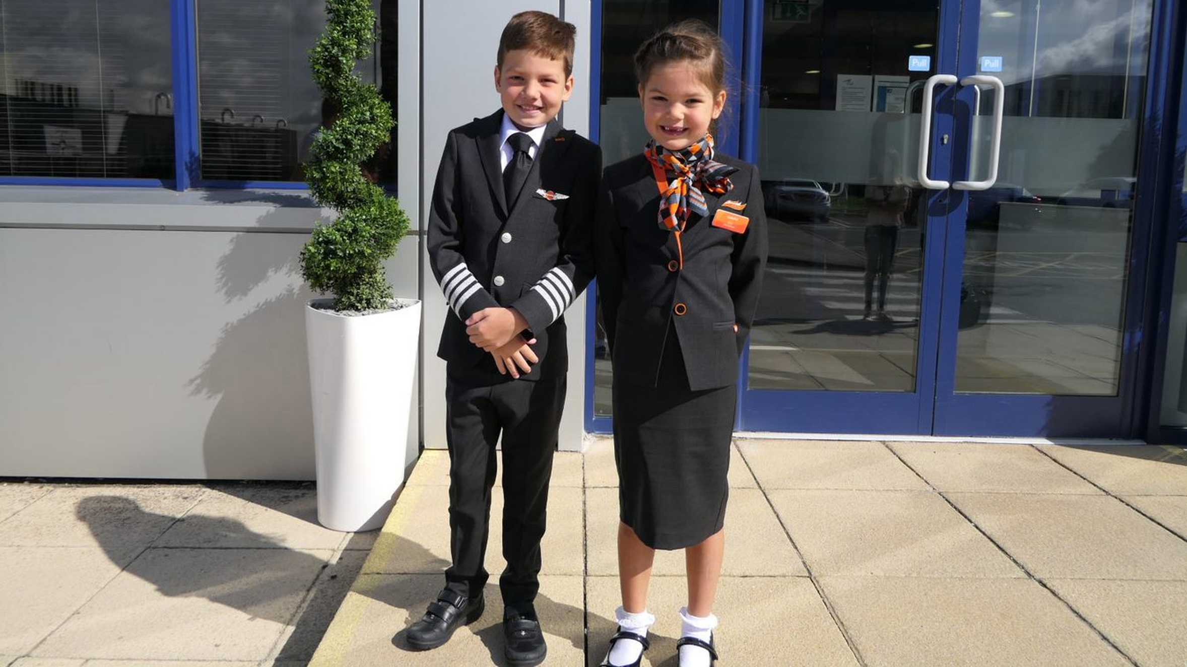 Jacob with his sister, Zoe on his wish to visit an aeroplane factory