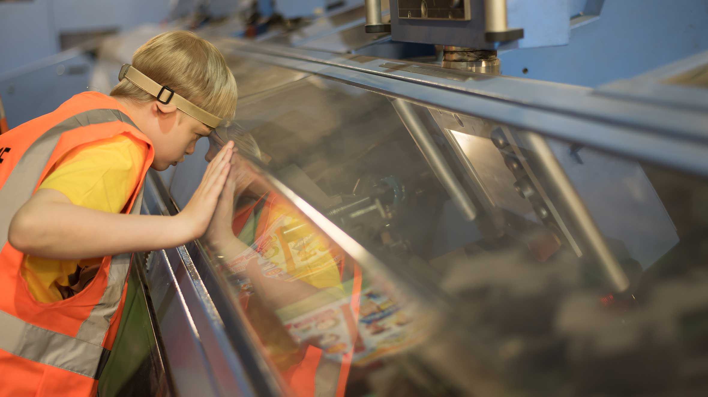 George watching the magazines being printed