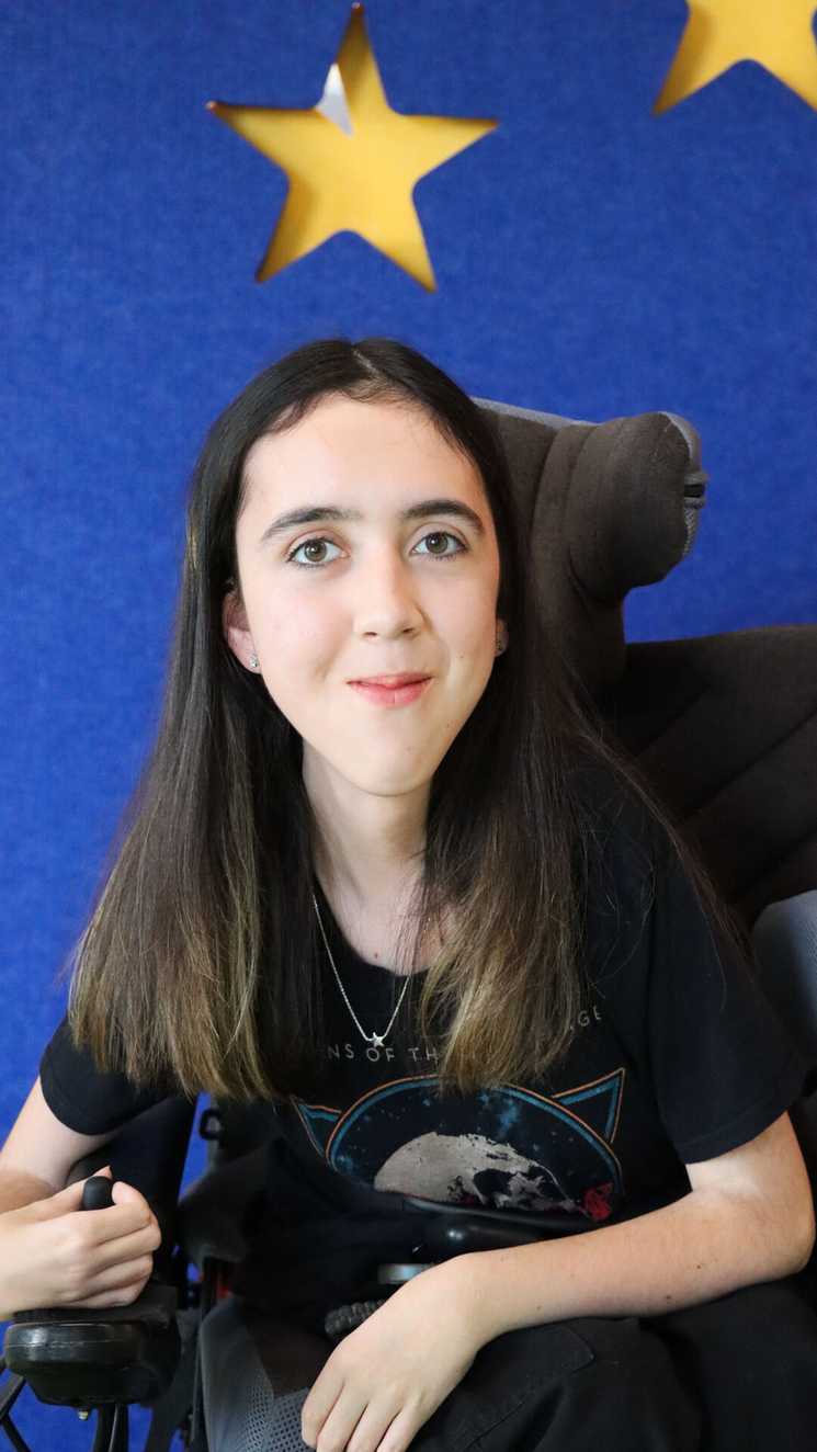 STARboard member Fran is looking at the camera, she is wearing a black t-shirt.