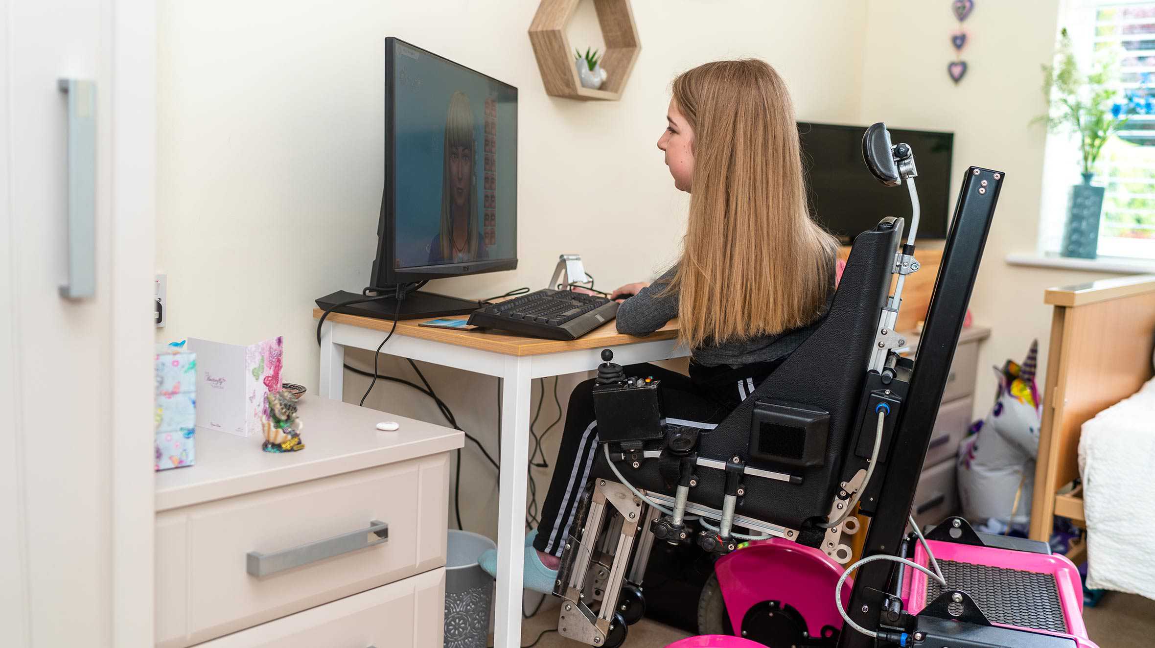 Sophie using her new gaming PC.