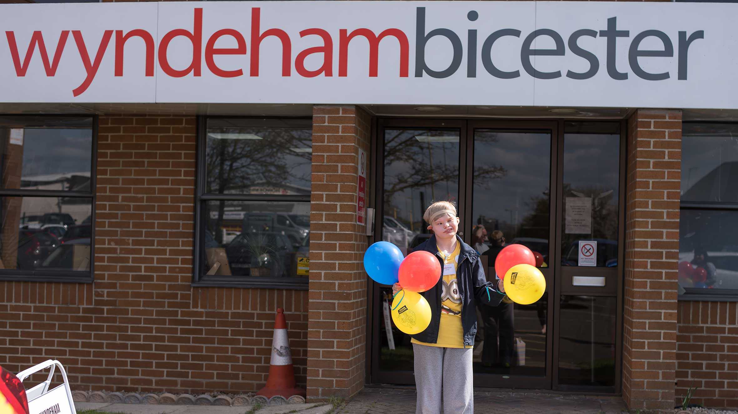 George outside the factory where CBeebies magazine is printed