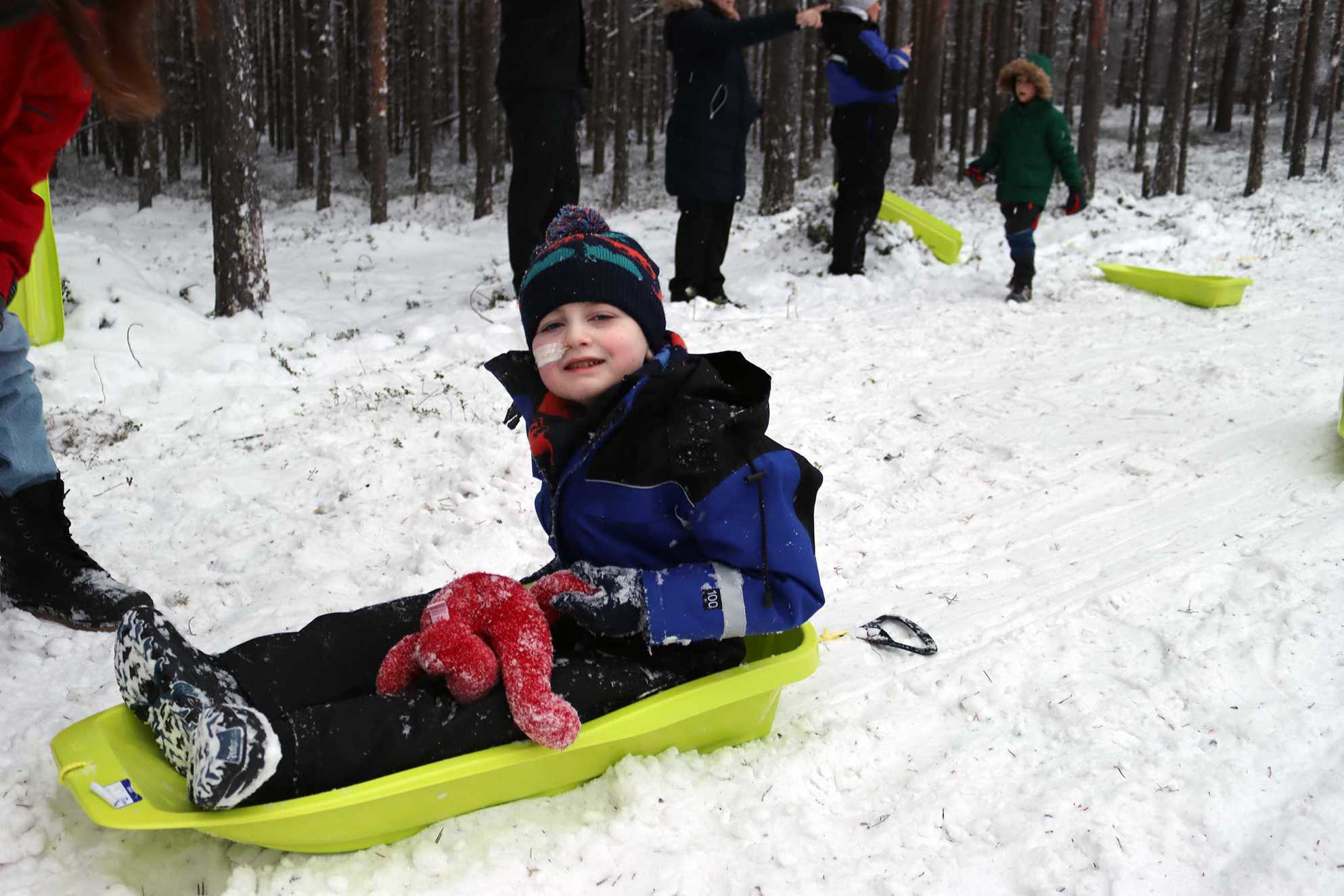 Tíernan sledging in the snow, during his trip to Lapland.