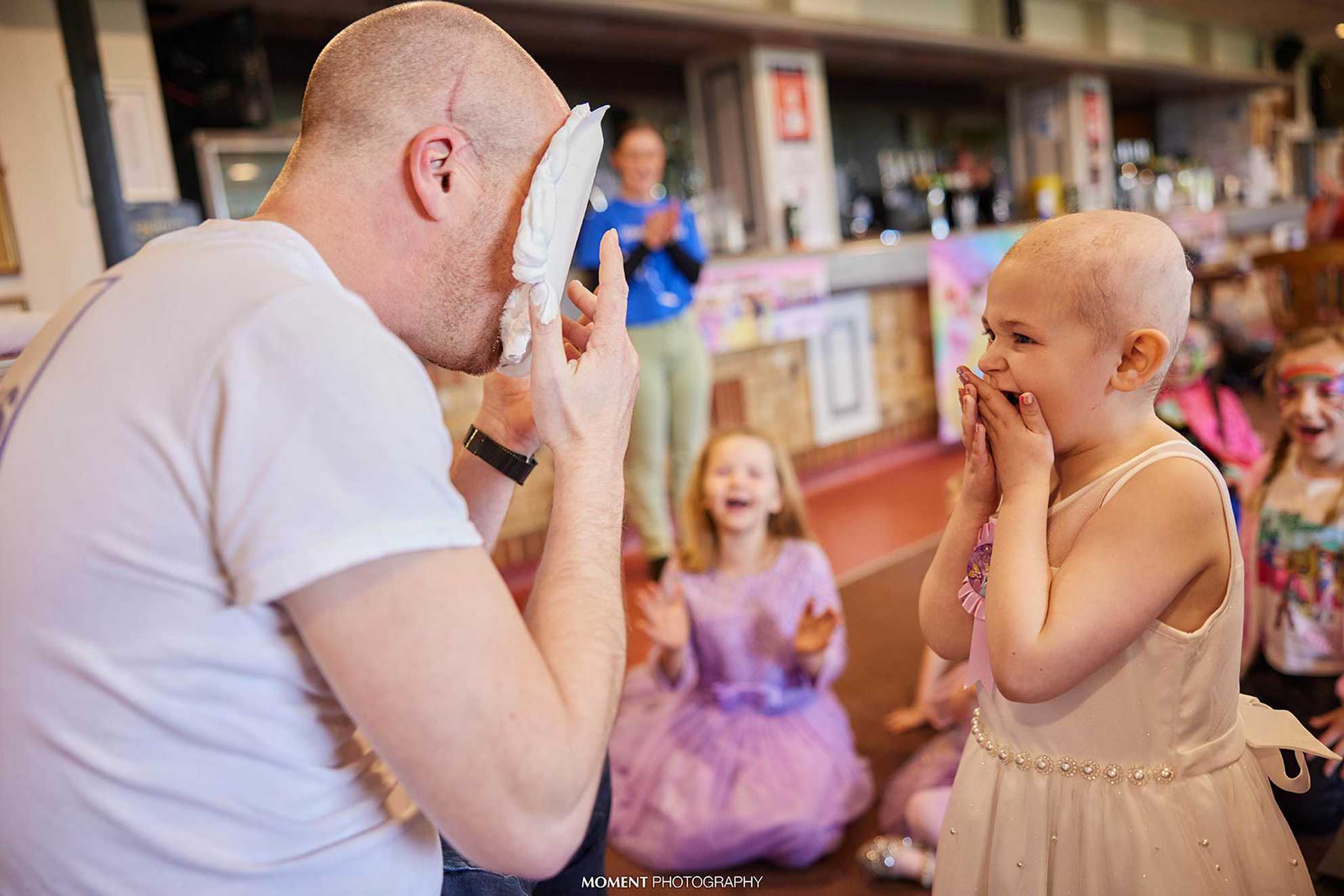 Ryleigh getting her chance to pie the entertainer in their face.