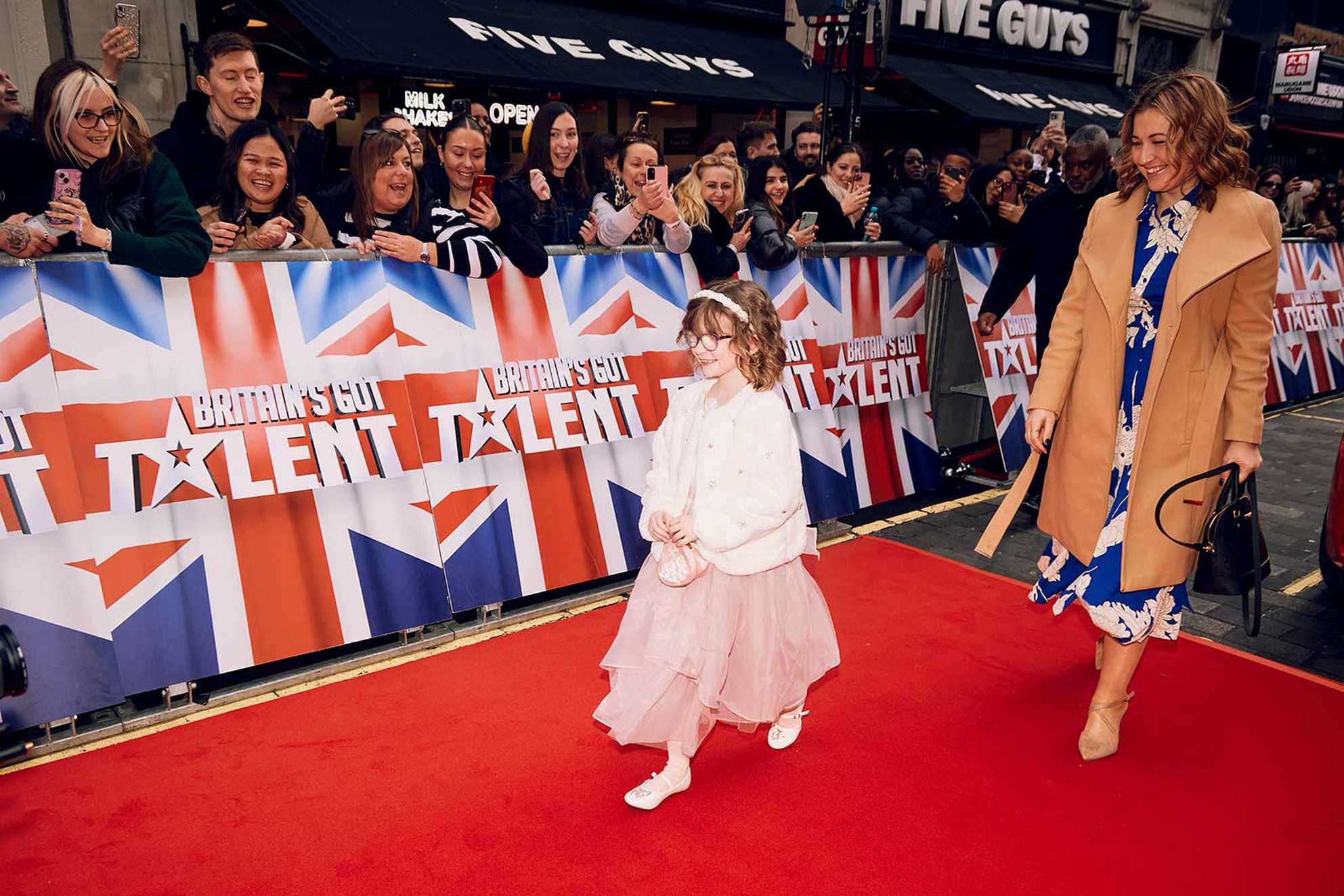 Wish child, Dulcie walking down the red carpet with her mum to watch Britain's Got Talent being recorded.