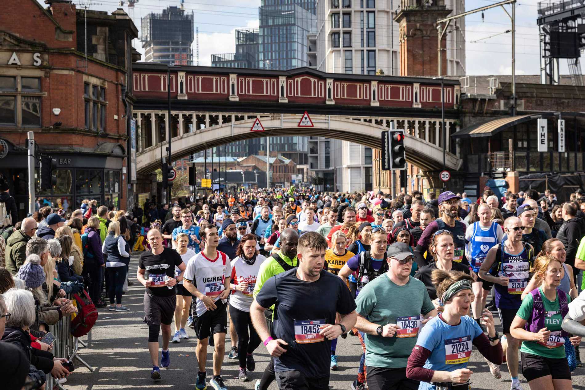 Runners making their way along Castle Street during the Manchester Marathon.