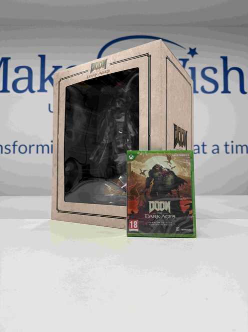 Doom XBox game propped in front of a Doom toy box