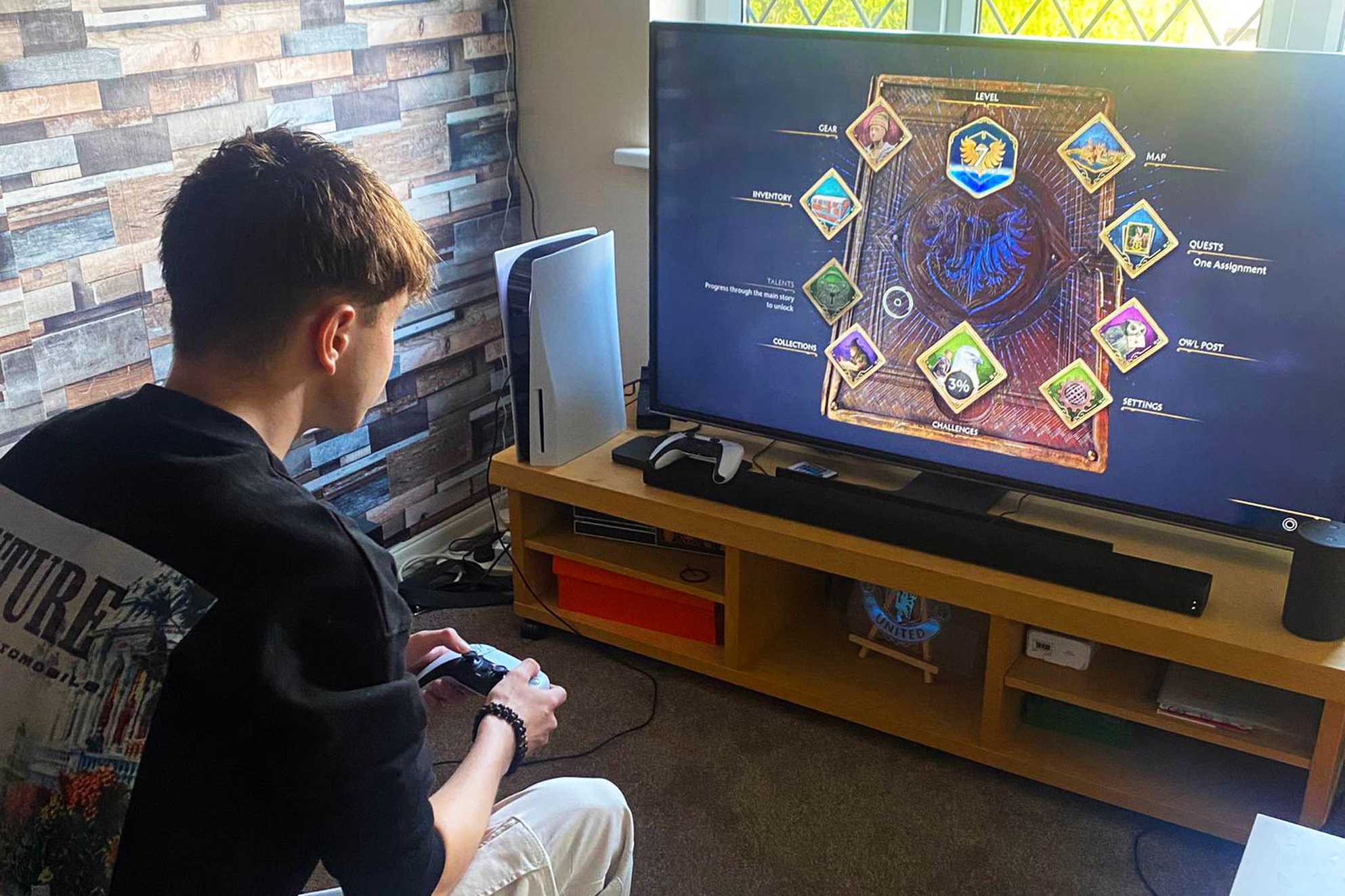 Ben playing on his new Playstation 5.