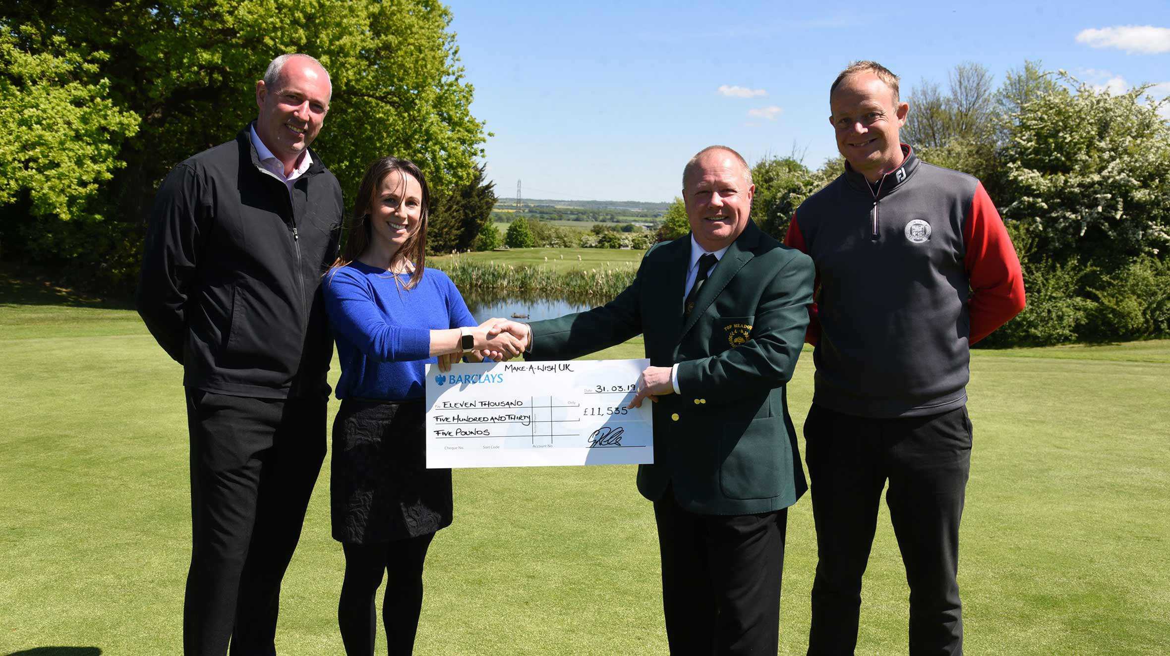 Graham Richards from Top Meadow Golf Club presenting a cheque to Danielle from Make-A-Wish UK