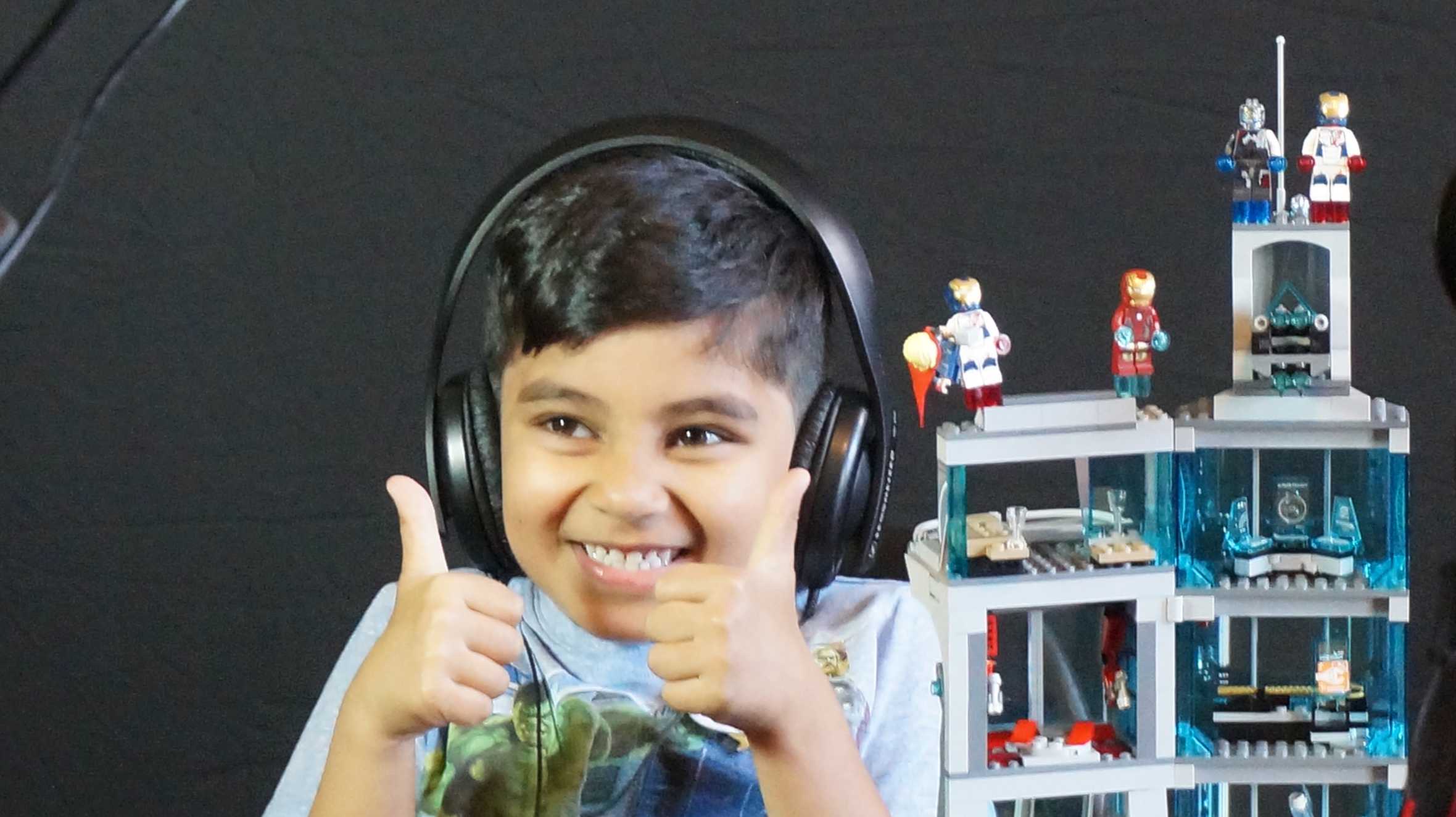 Khayyam with his thumbs up while filming his vlog