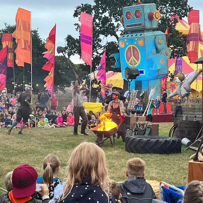 A group of performers at Camp Bestival.