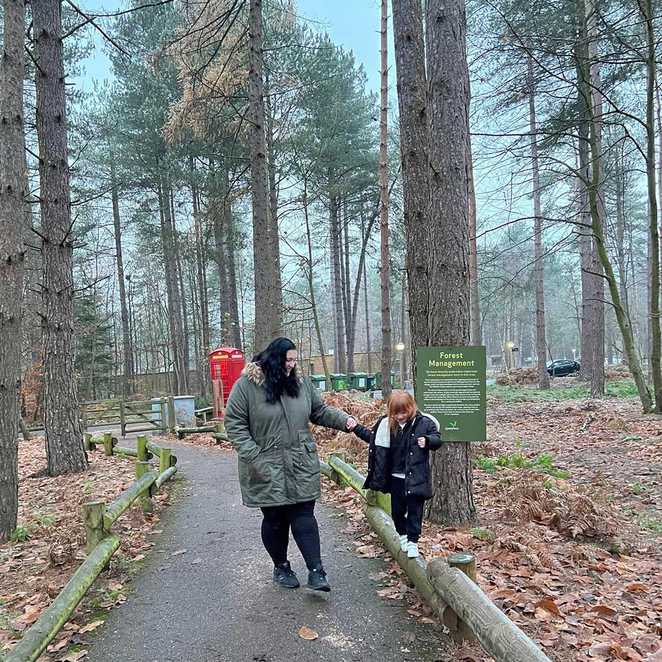 Charlotte and mum, Harley enjoying a walk through the trees at Center Parcs.