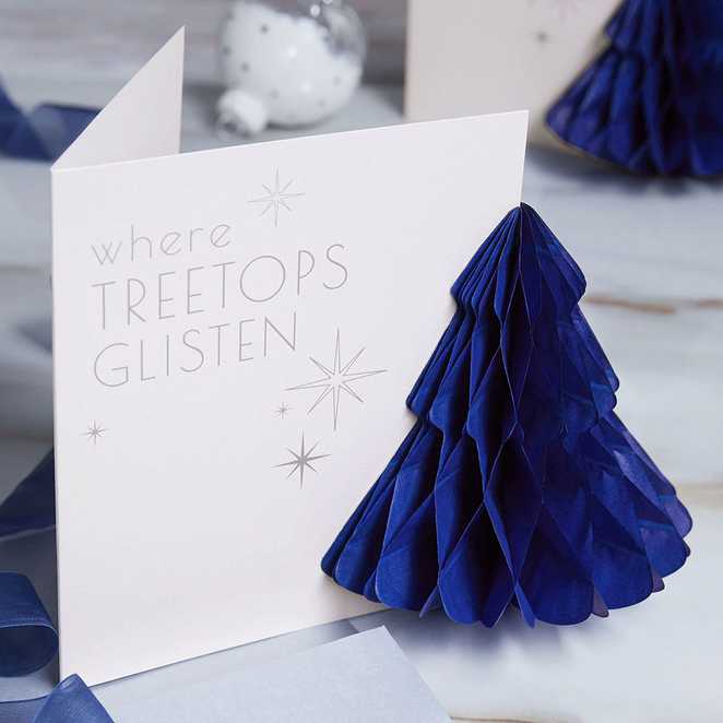 A Next Christmas card design featuring a blue pop out Christmas tree.