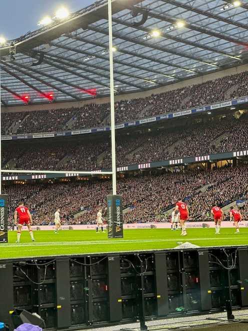 The view from Seth's seat as England and Wales play rugby near the goalposts in front of him