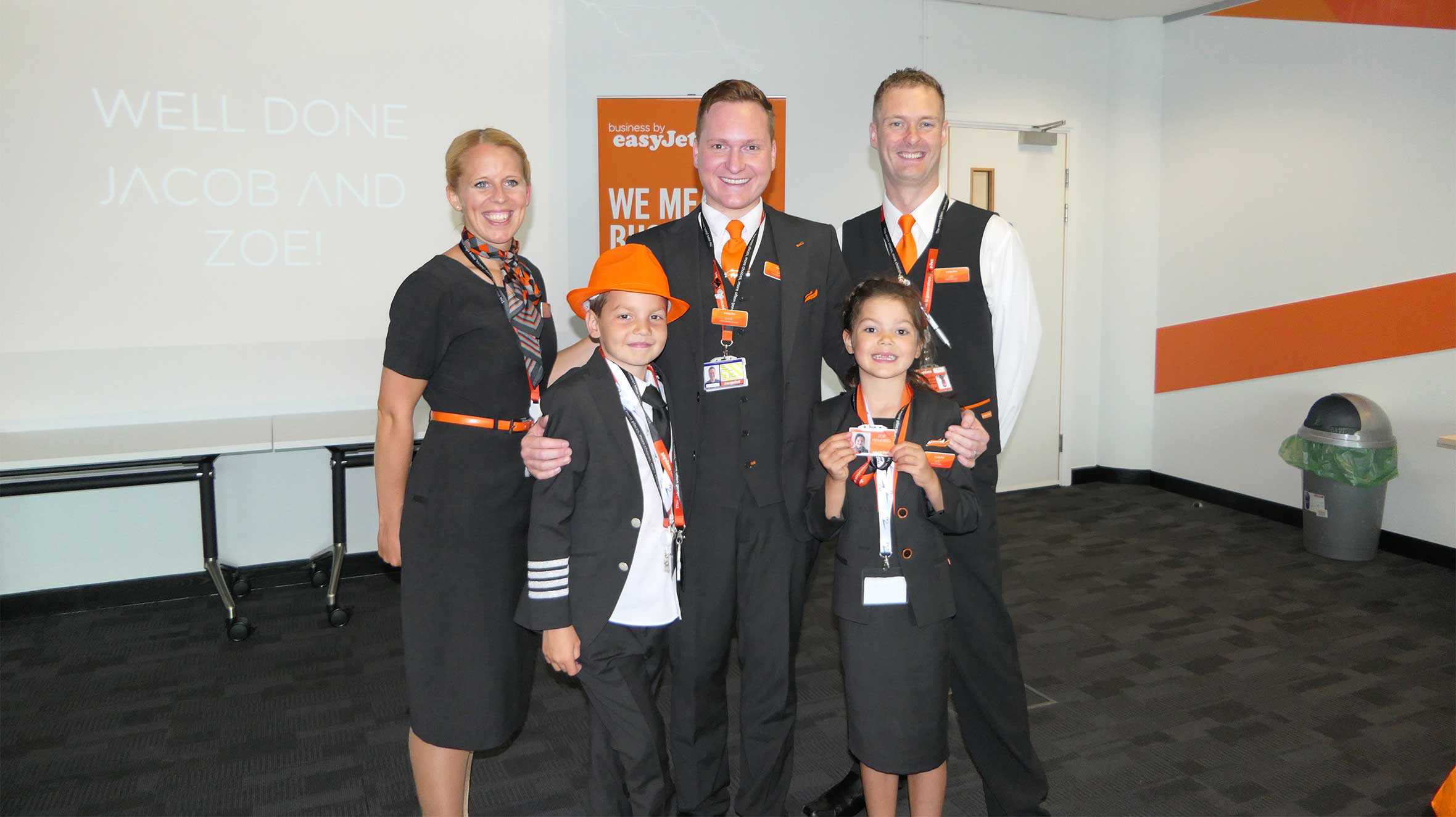 Jacob and his sister, Zoe with members of the flight crew
