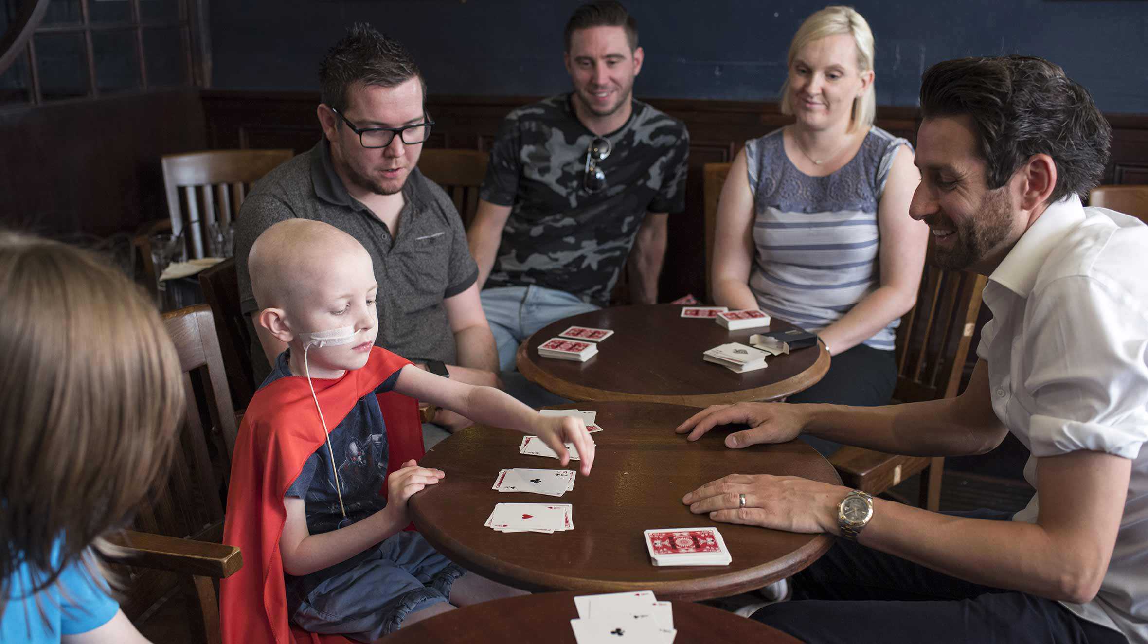 Dexter performing a card trick