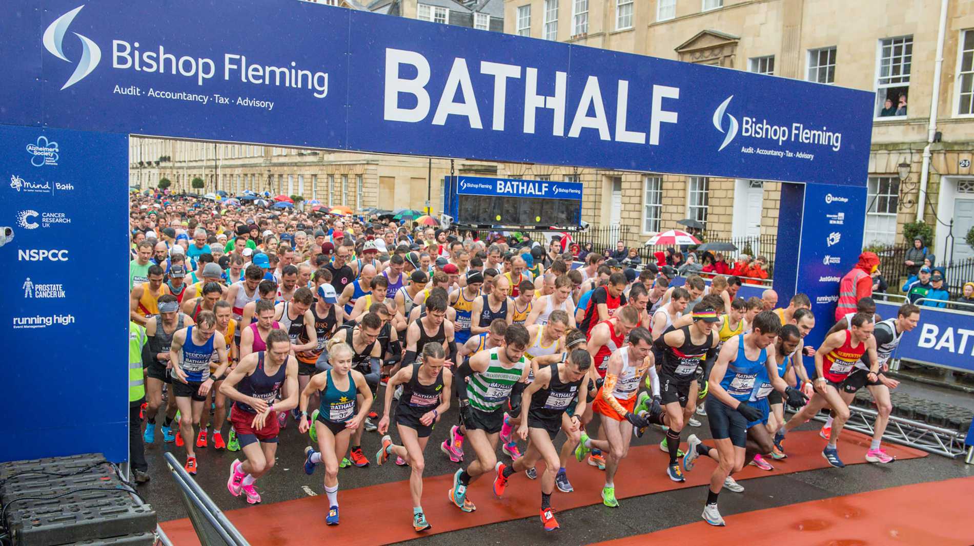 Runners setting off at the start of the Bath Half Marathon.