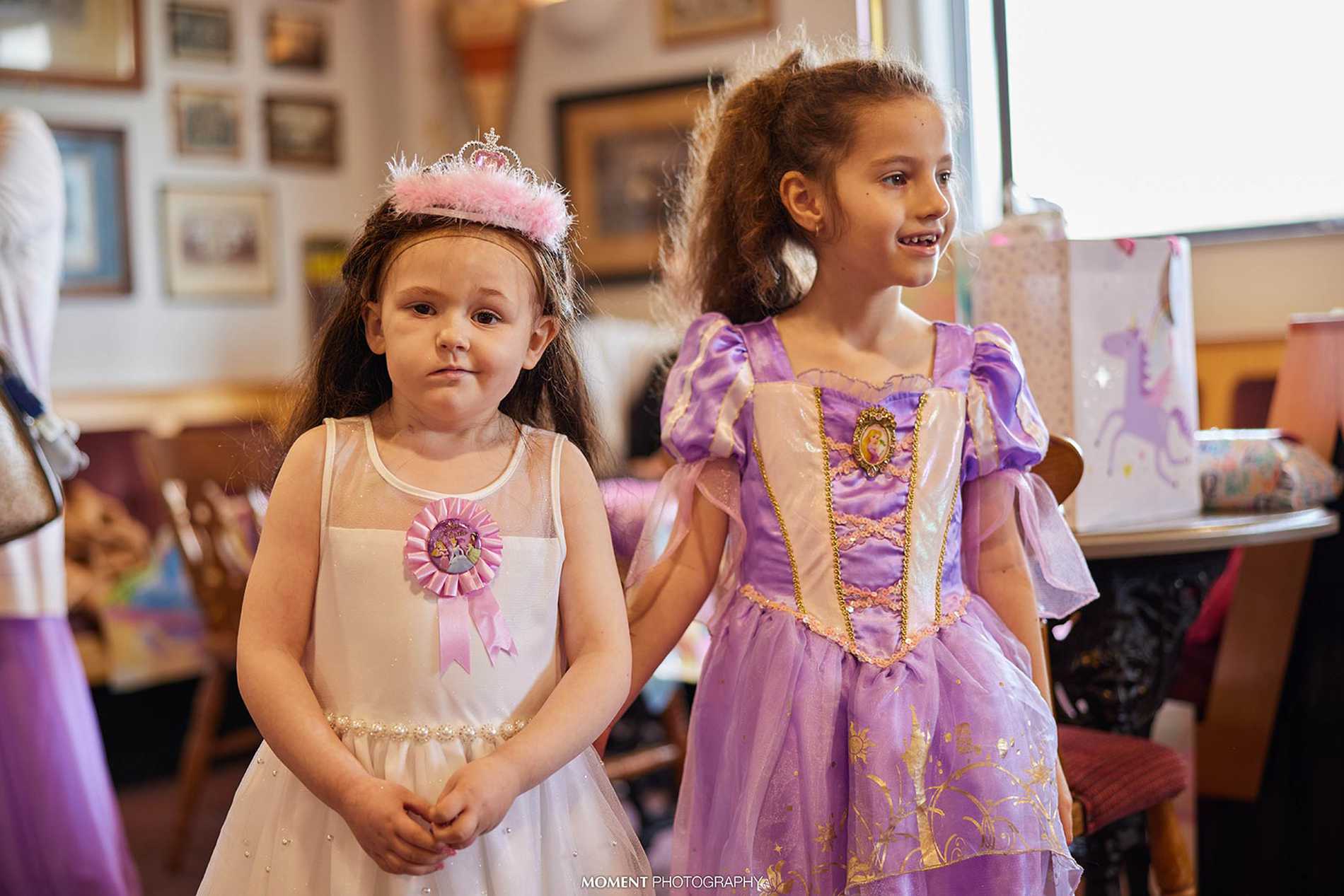 Wish child Ryleigh and her friend, dressed as princesses at her birthday party.