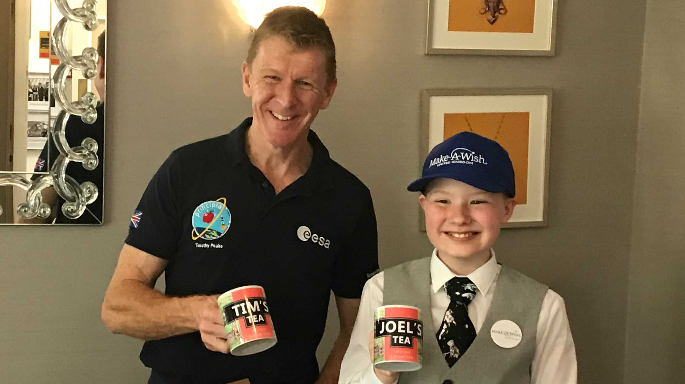 Joel and Tim Peake with their cups of tea