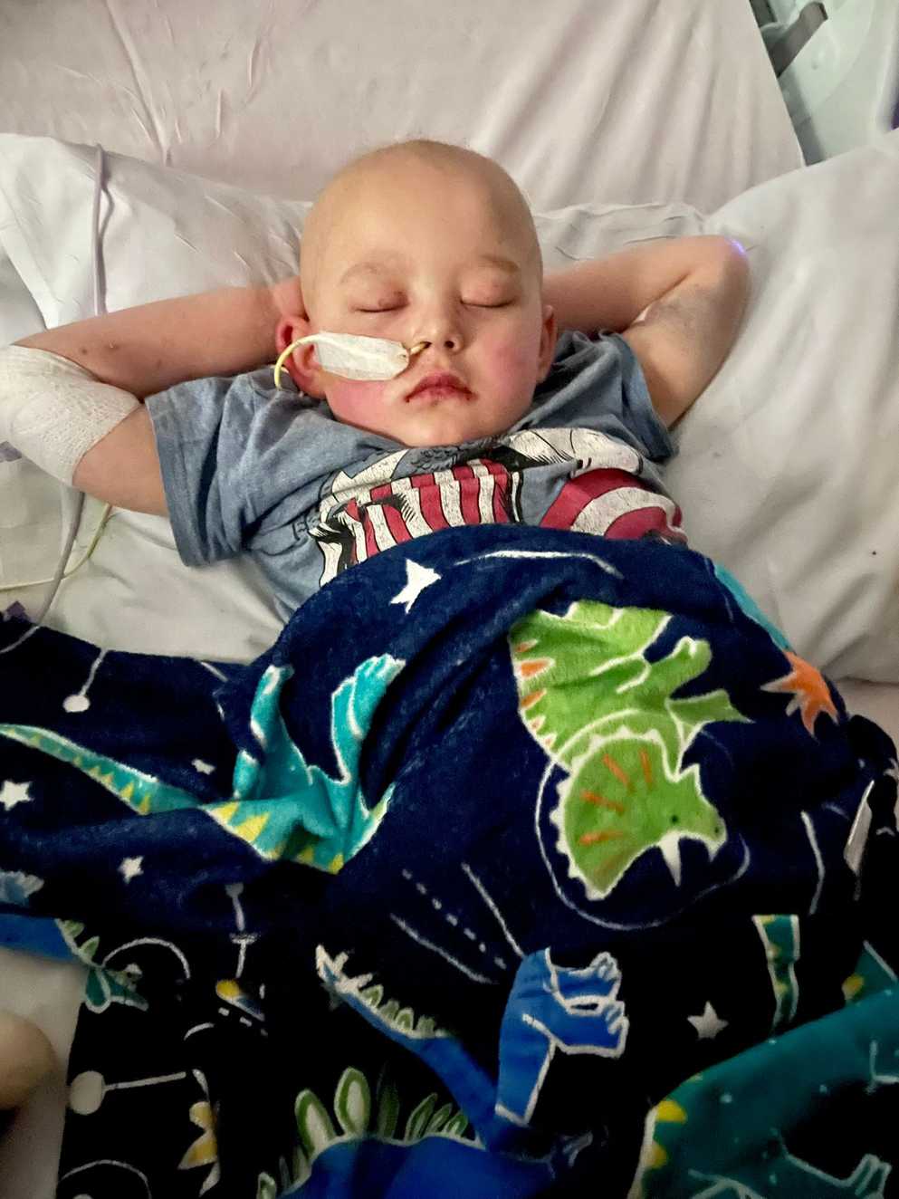 Jaxen having treatment in a hospital bed