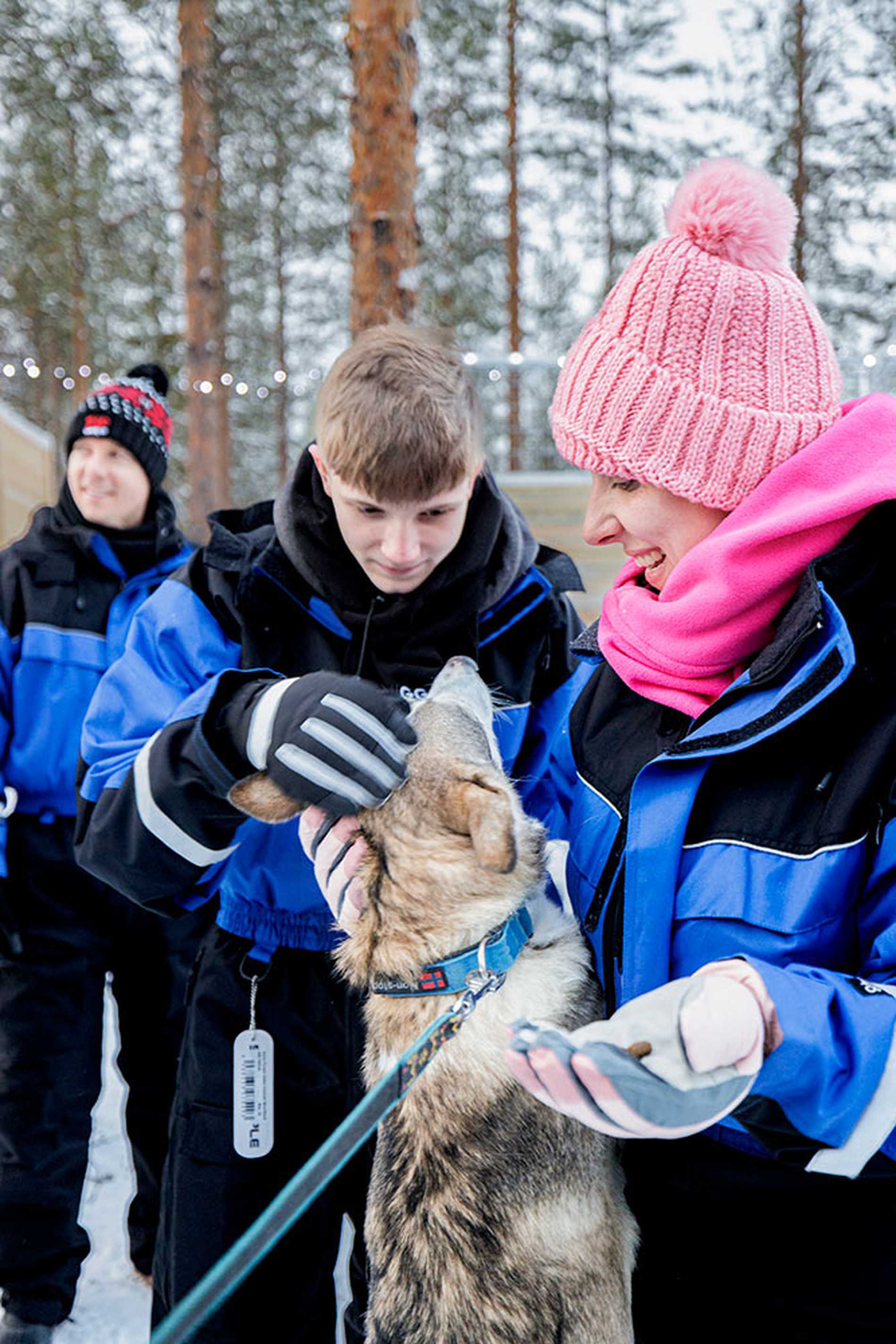 Mum and Joshua with one of the huskies.