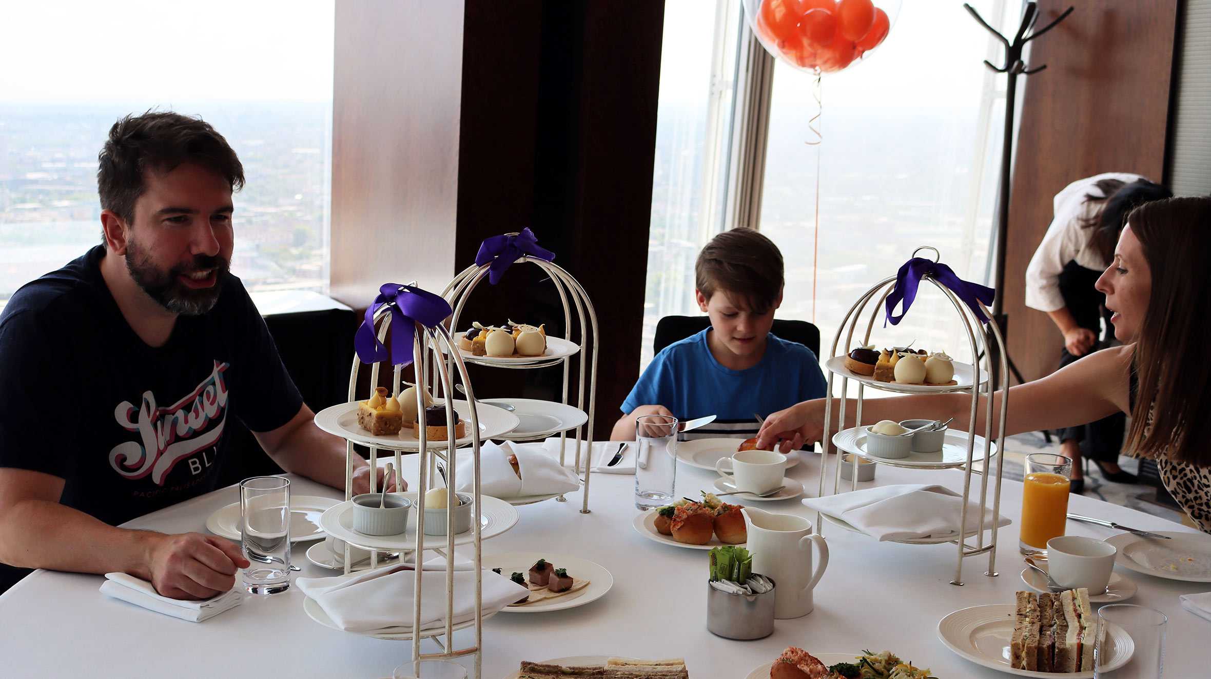 Clark, Jamie and Sally enjoying afternoon tea together.