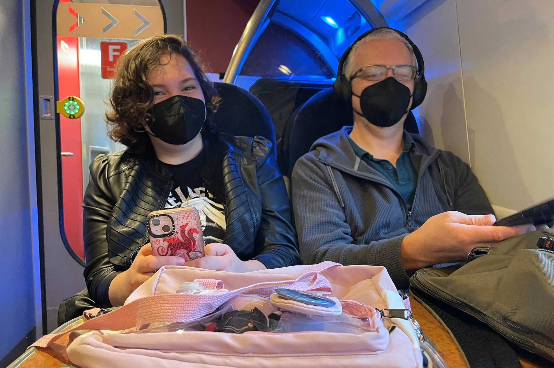 Elsie and her dad on the train, on their way to London for her wish