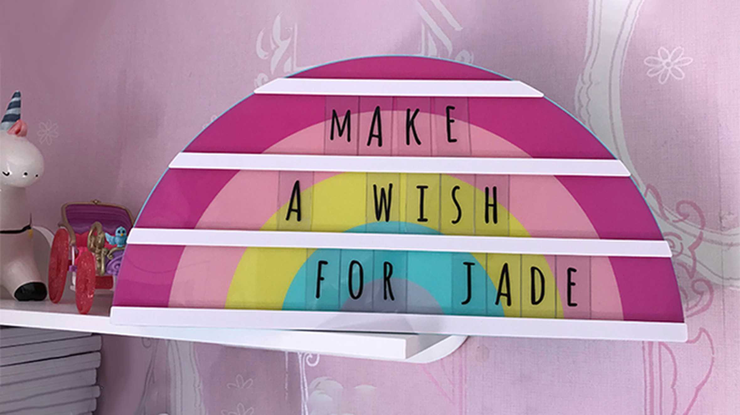 Rainbow sign saying 'Make a wish for Jade'