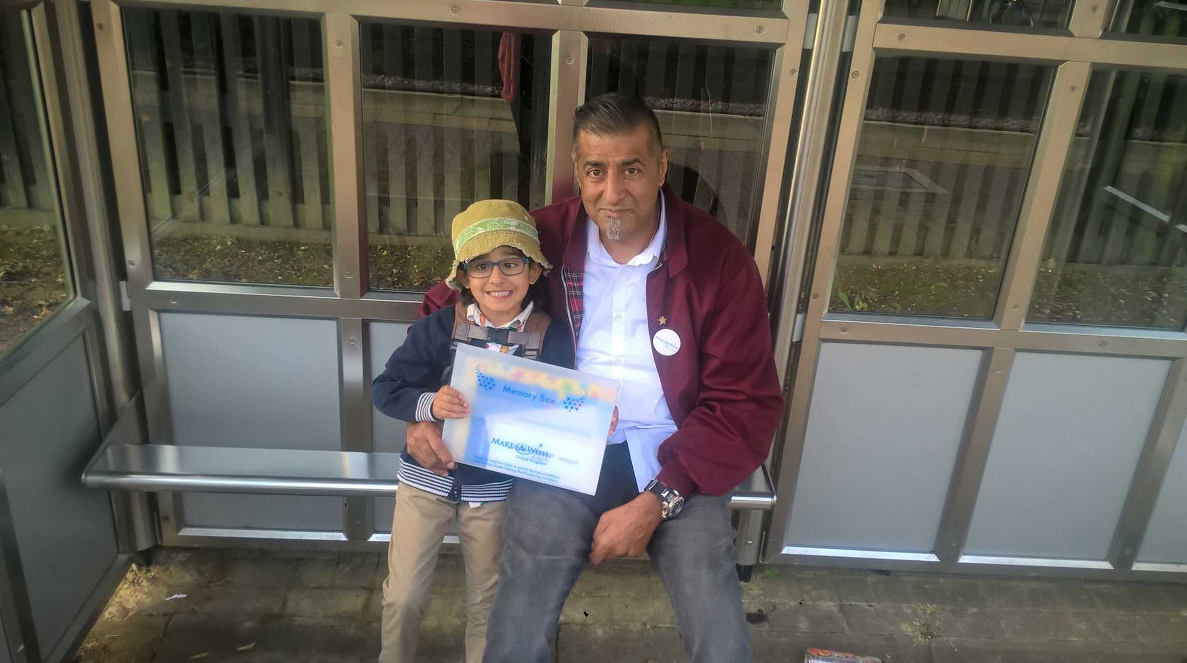 Arjun and his dad with his wish pack