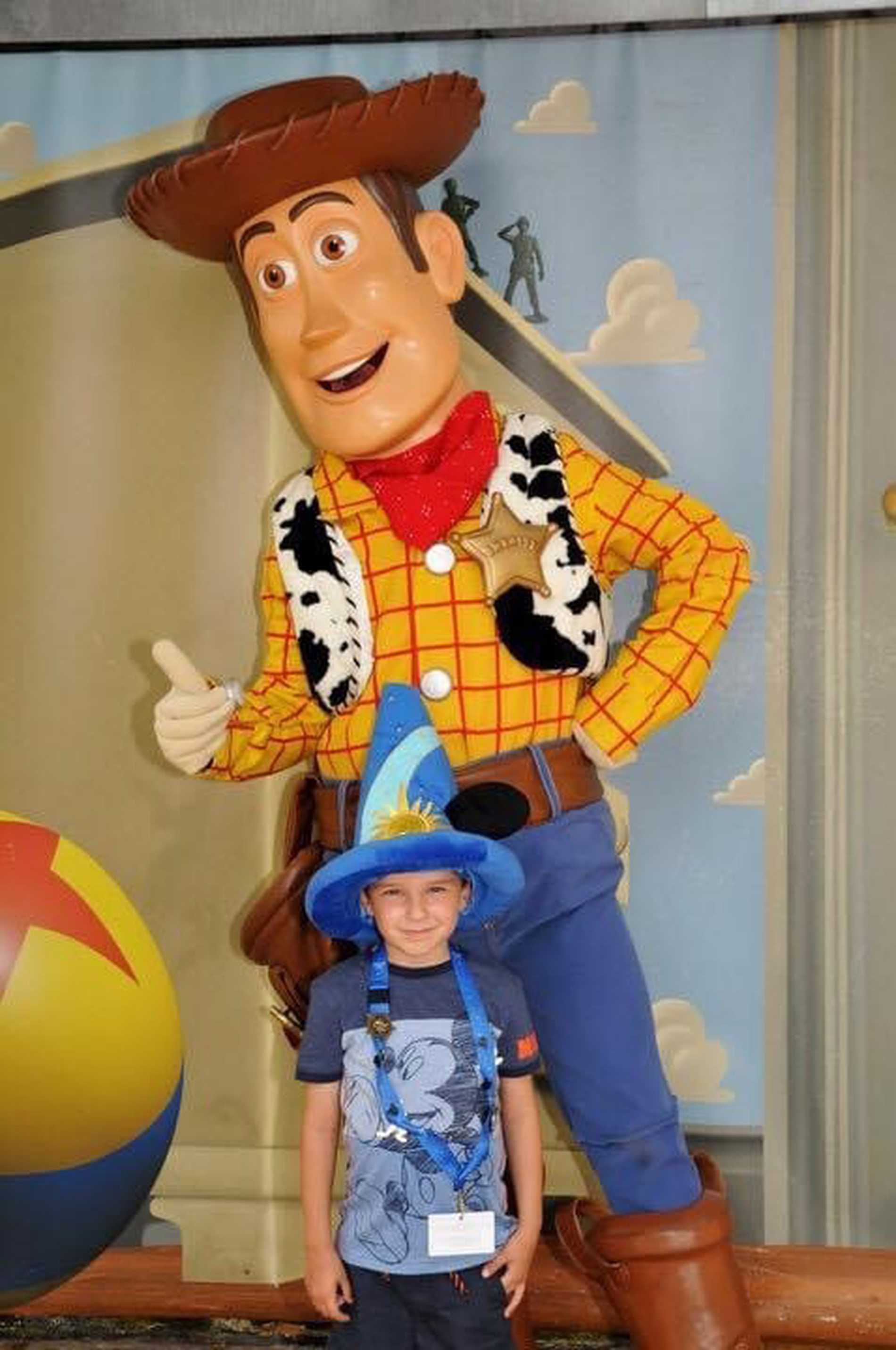Isaac meeting his hero, Woody from Toy Story.