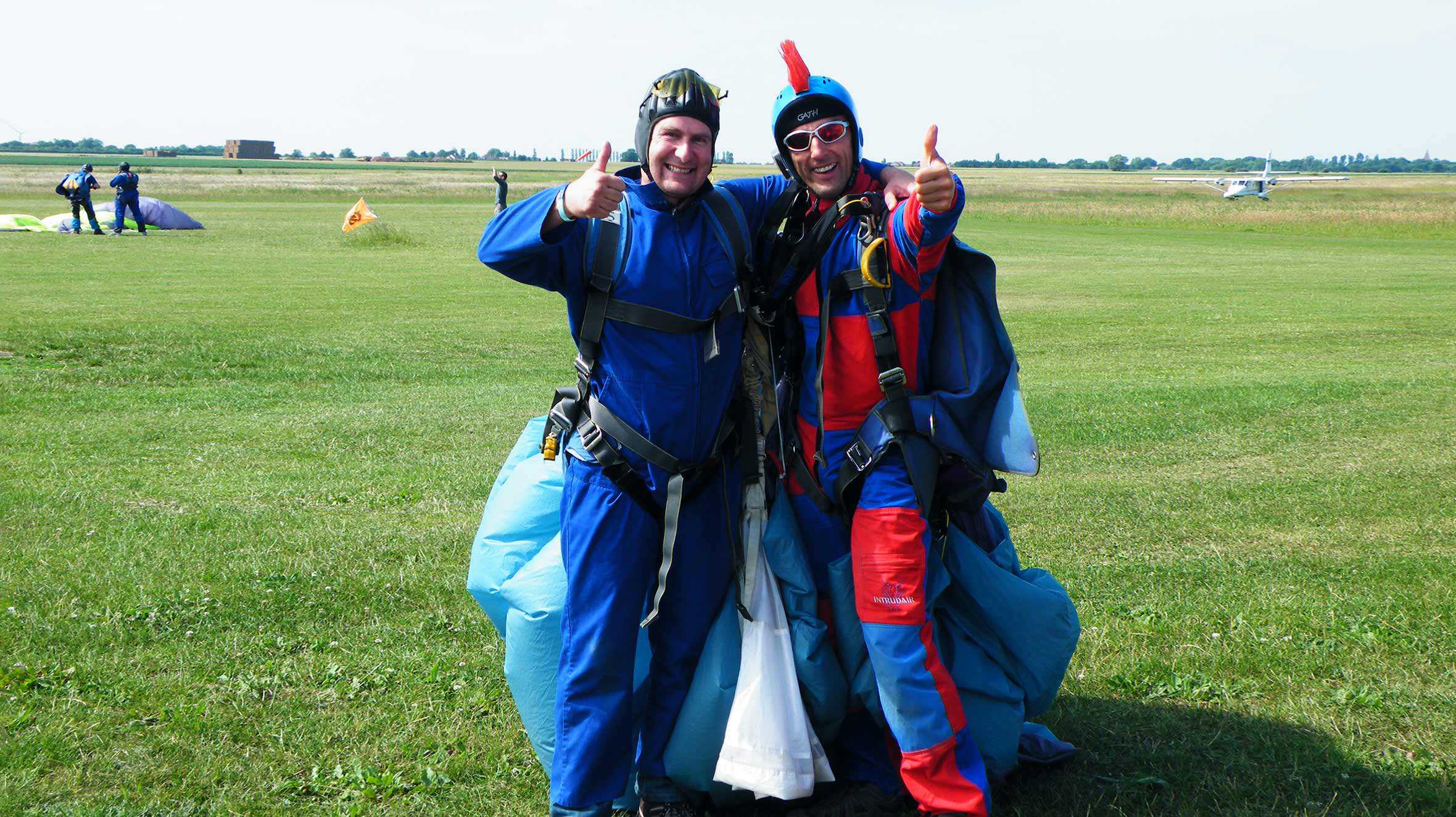 Simon celebrating after completing his skydive for Make-A-Wish UK in 2009.