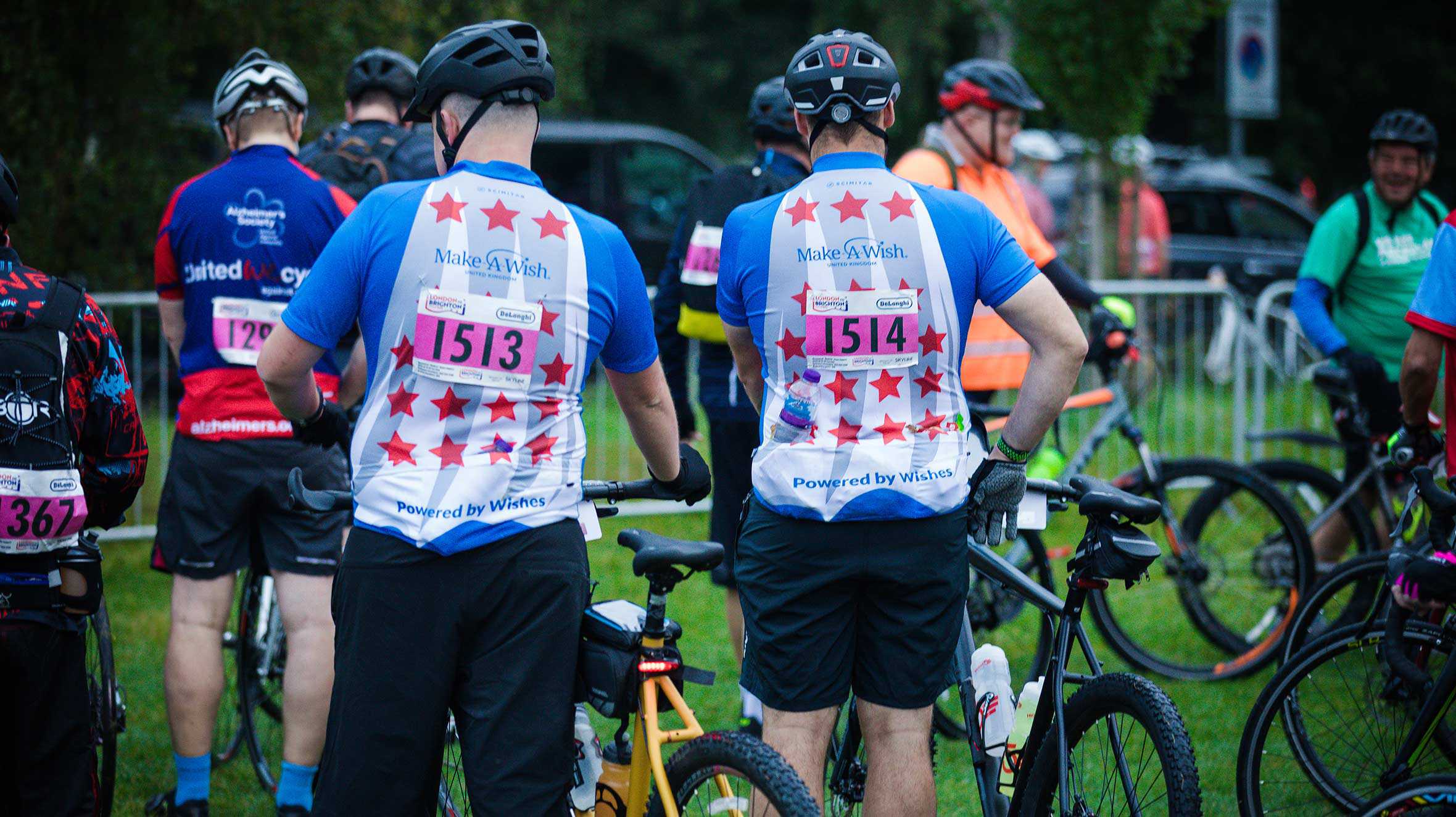 A rear view of two #WishHeroes getting ready to take part in the 2021 London to Brighton Cycle challenge.